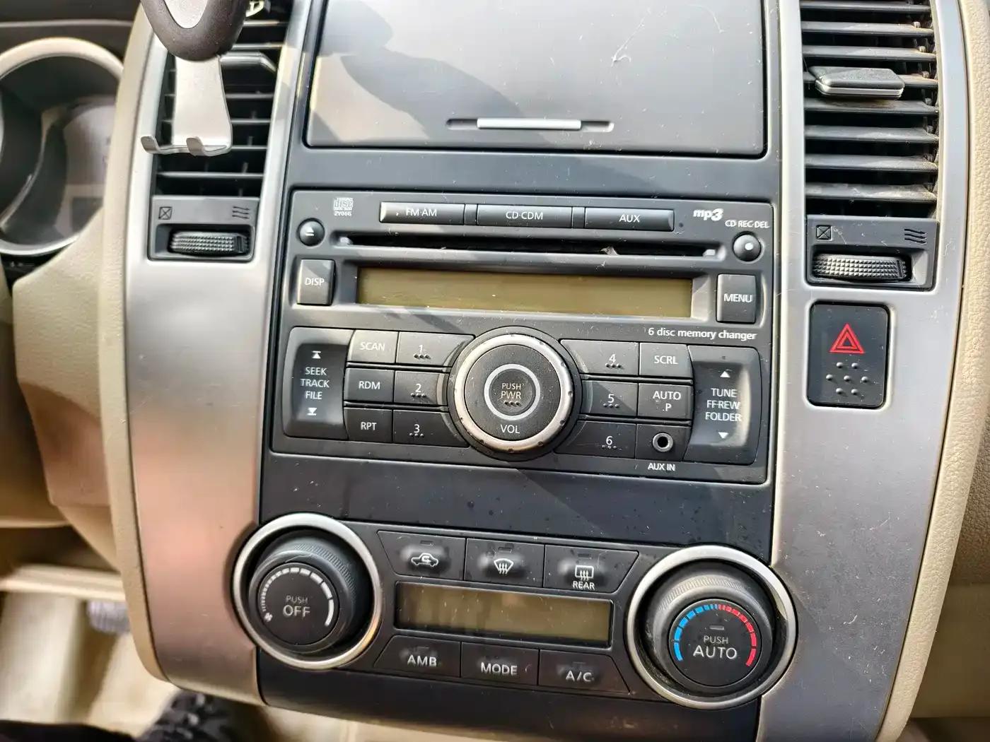 Tiida 2008 1.6L Manual Intelligent — миниатюра 16