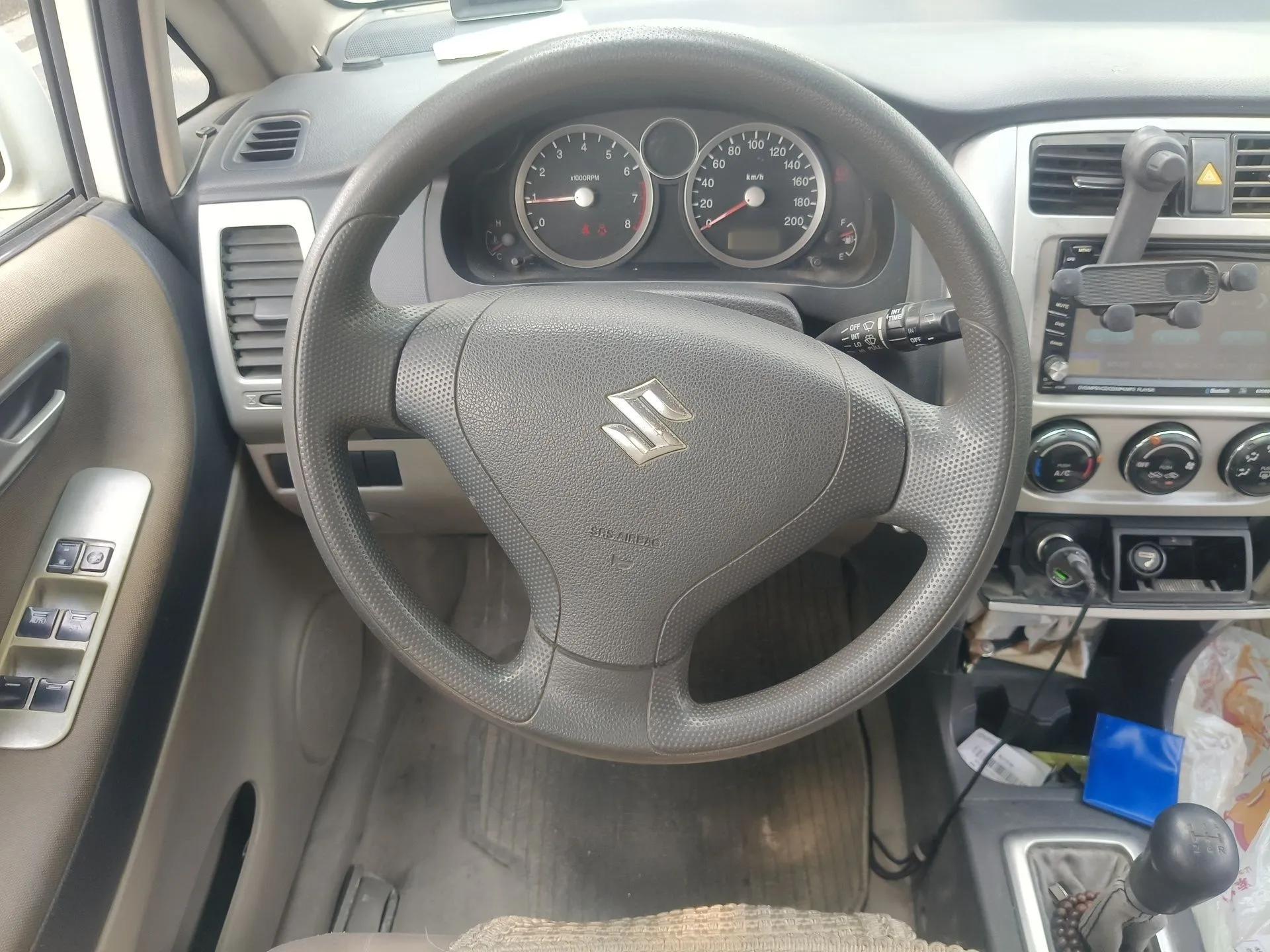 Suzuki Liana 2011 A+ Hatchback 1.4L Manual Standard Model — миниатюра 11
