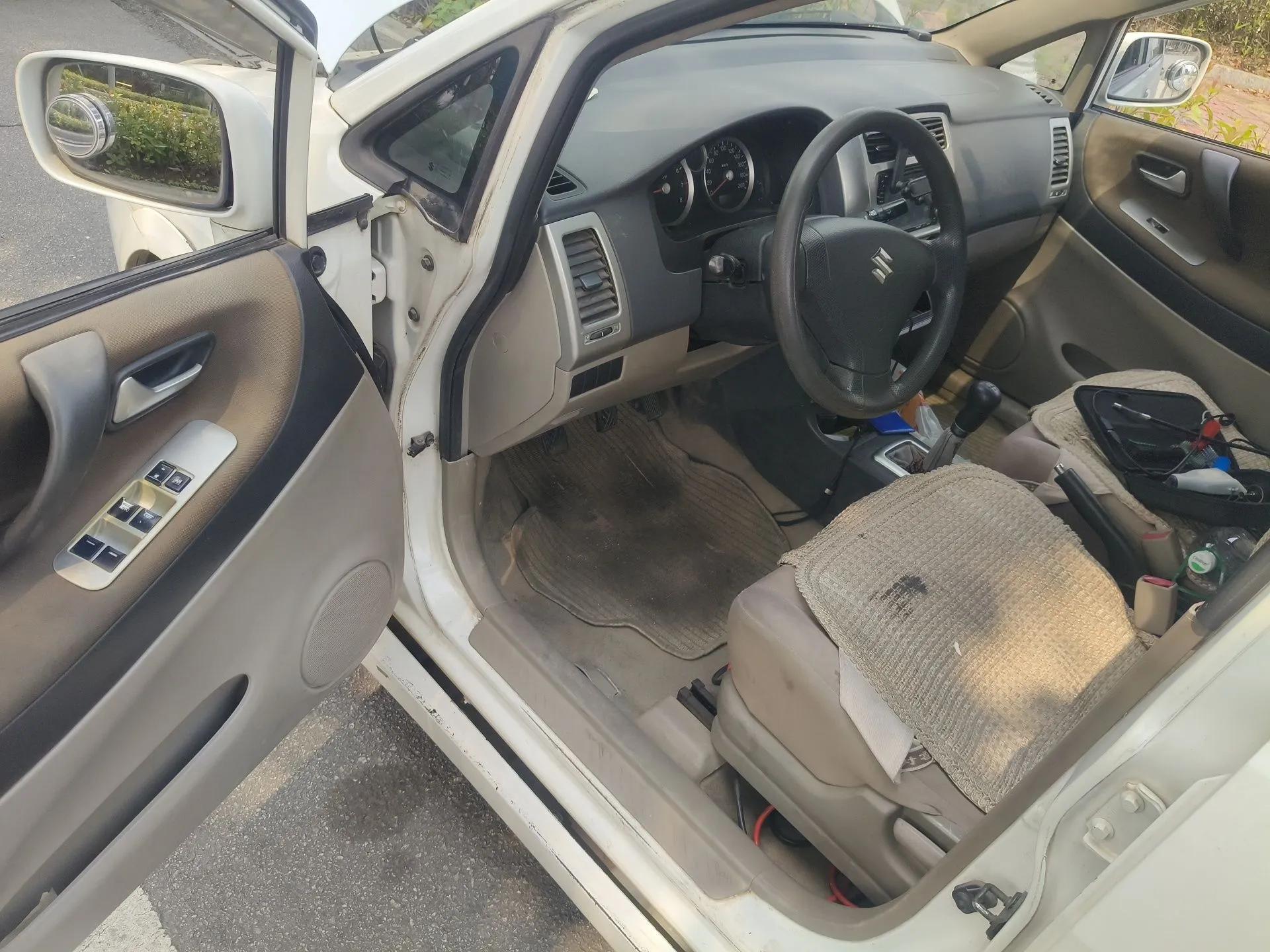 Suzuki Liana 2011 A+ Hatchback 1.4L Manual Standard Model — миниатюра 17
