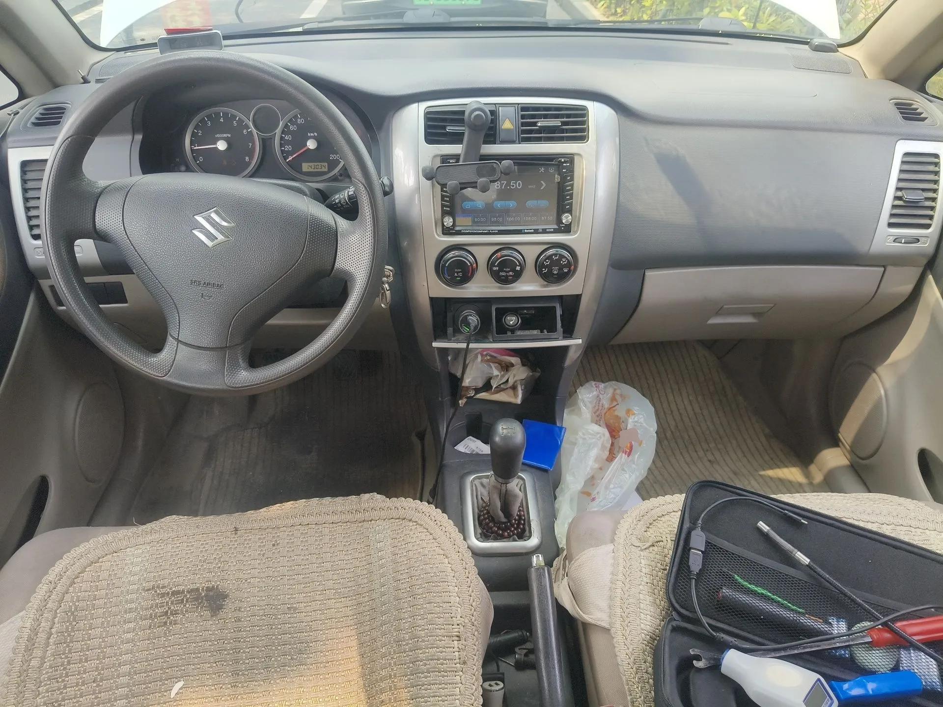 Suzuki Liana 2011 A+ Hatchback 1.4L Manual Standard Model — миниатюра 10