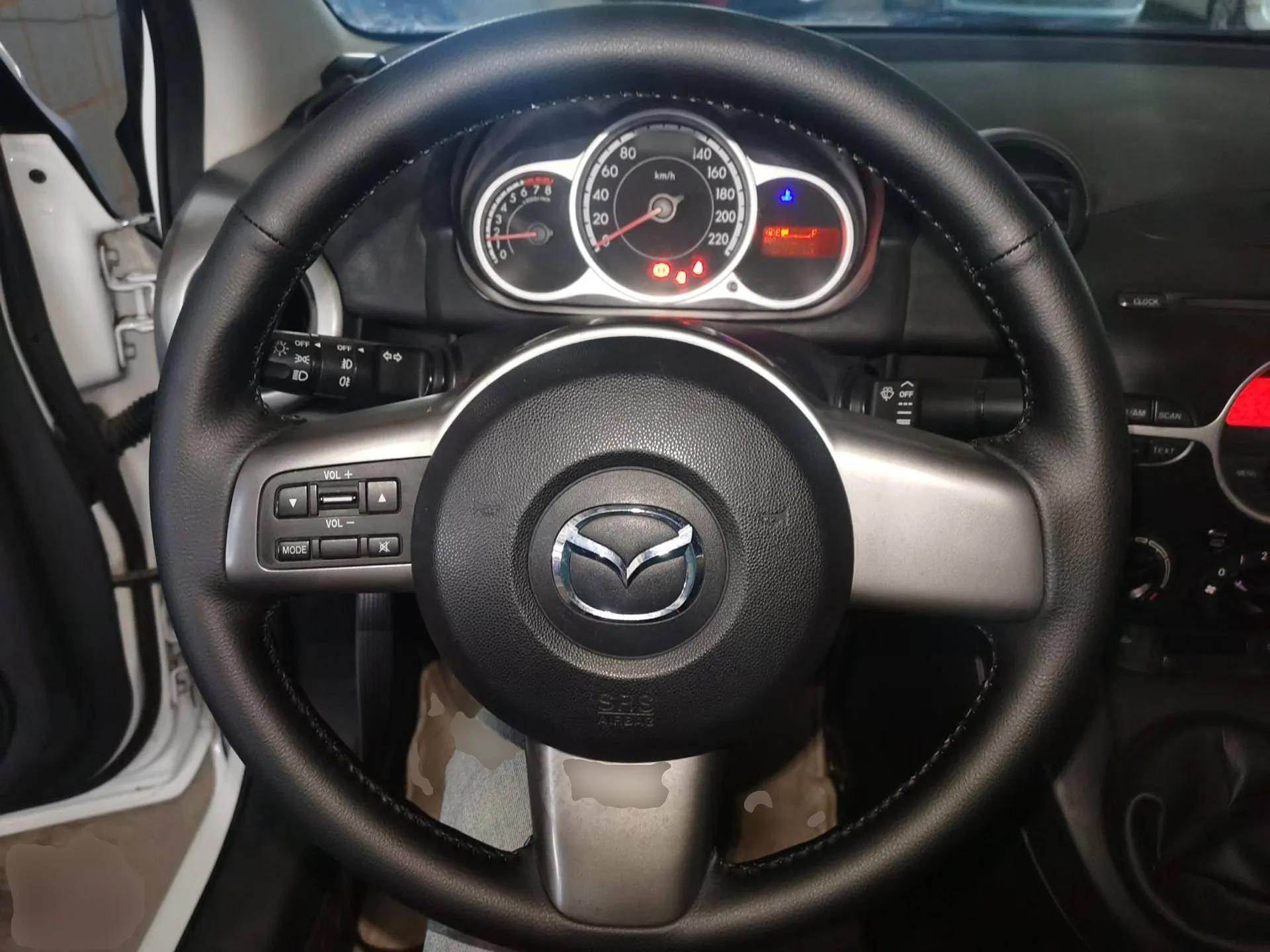 Mazda 2 2012 Sedan XuanDong 1.5L Manual Fashion Edition — миниатюра 14