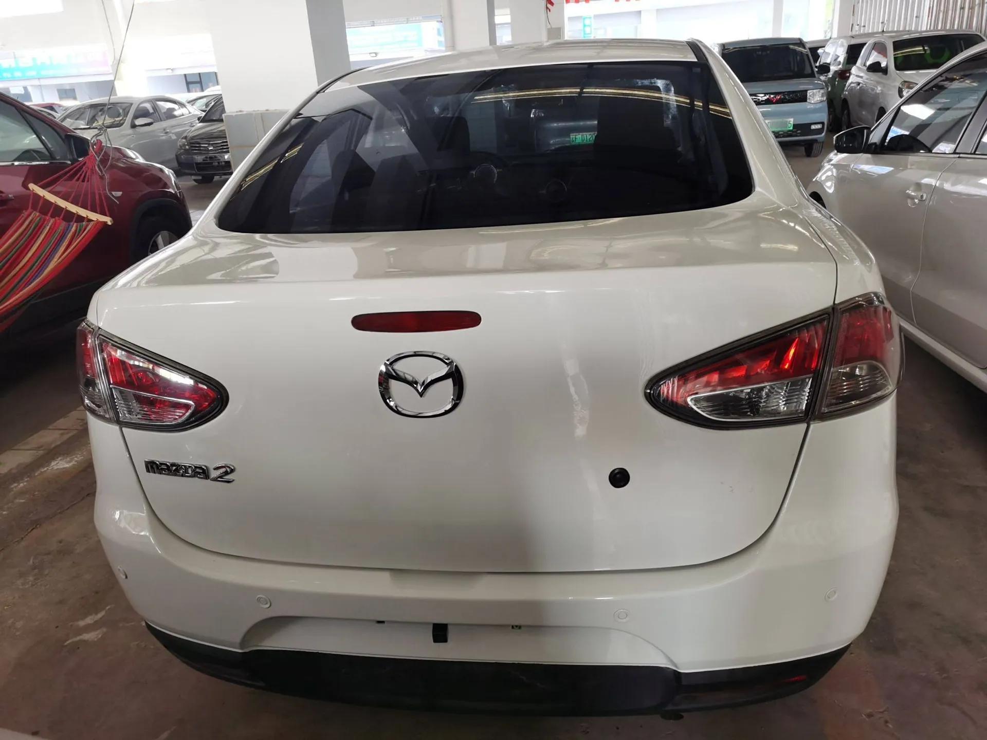 Mazda 2 2012 Sedan XuanDong 1.5L Manual Fashion Edition — миниатюра 5