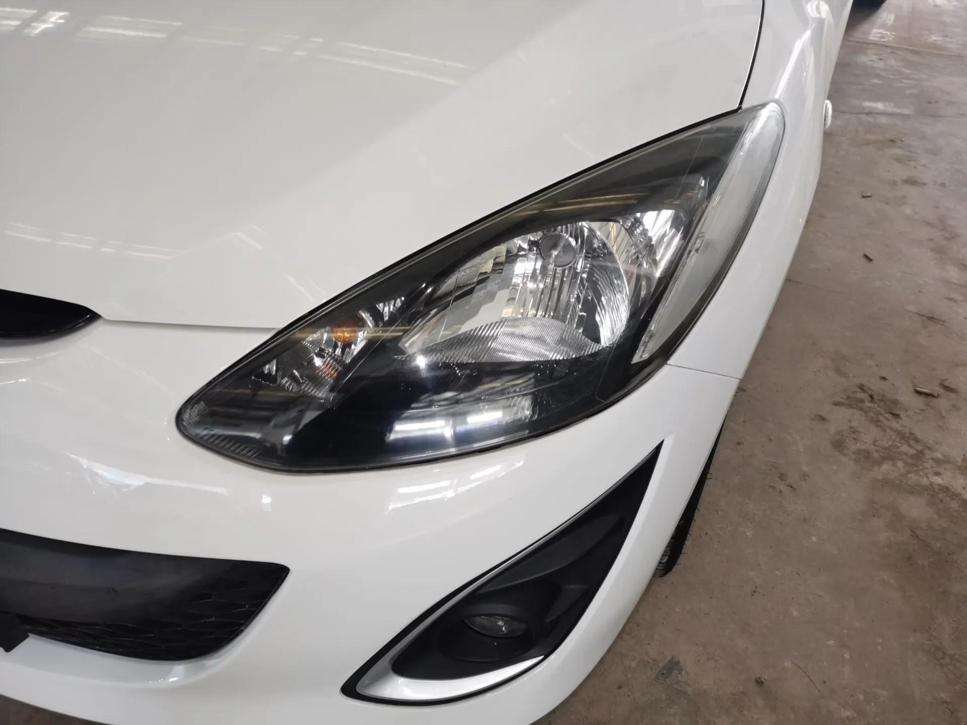 Mazda 2 2012 Sedan XuanDong 1.5L Manual Fashion Edition — миниатюра 9