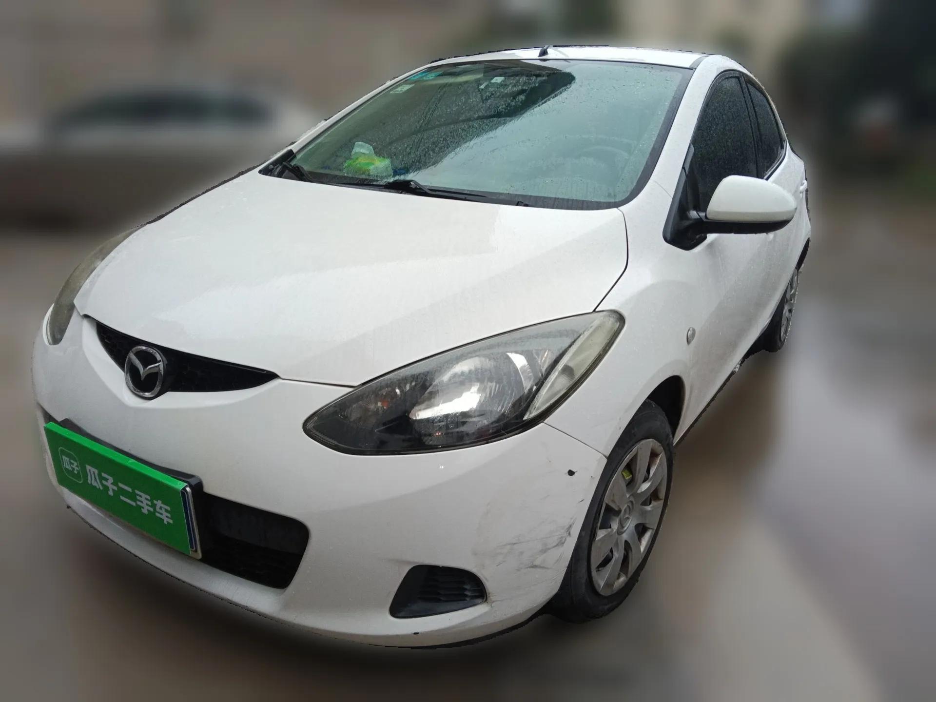Mazda 2 2012 Hatchback Xuan Dong 1.3L Automatic Standard Edition — миниатюра 1