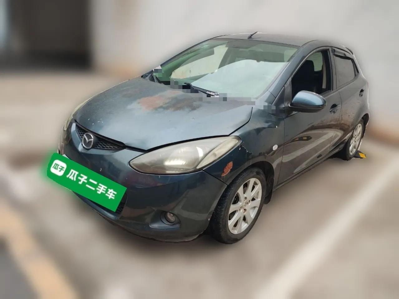 Mazda 2 2011 XuanDong 1.5L Automatic Value Edition — миниатюра 1