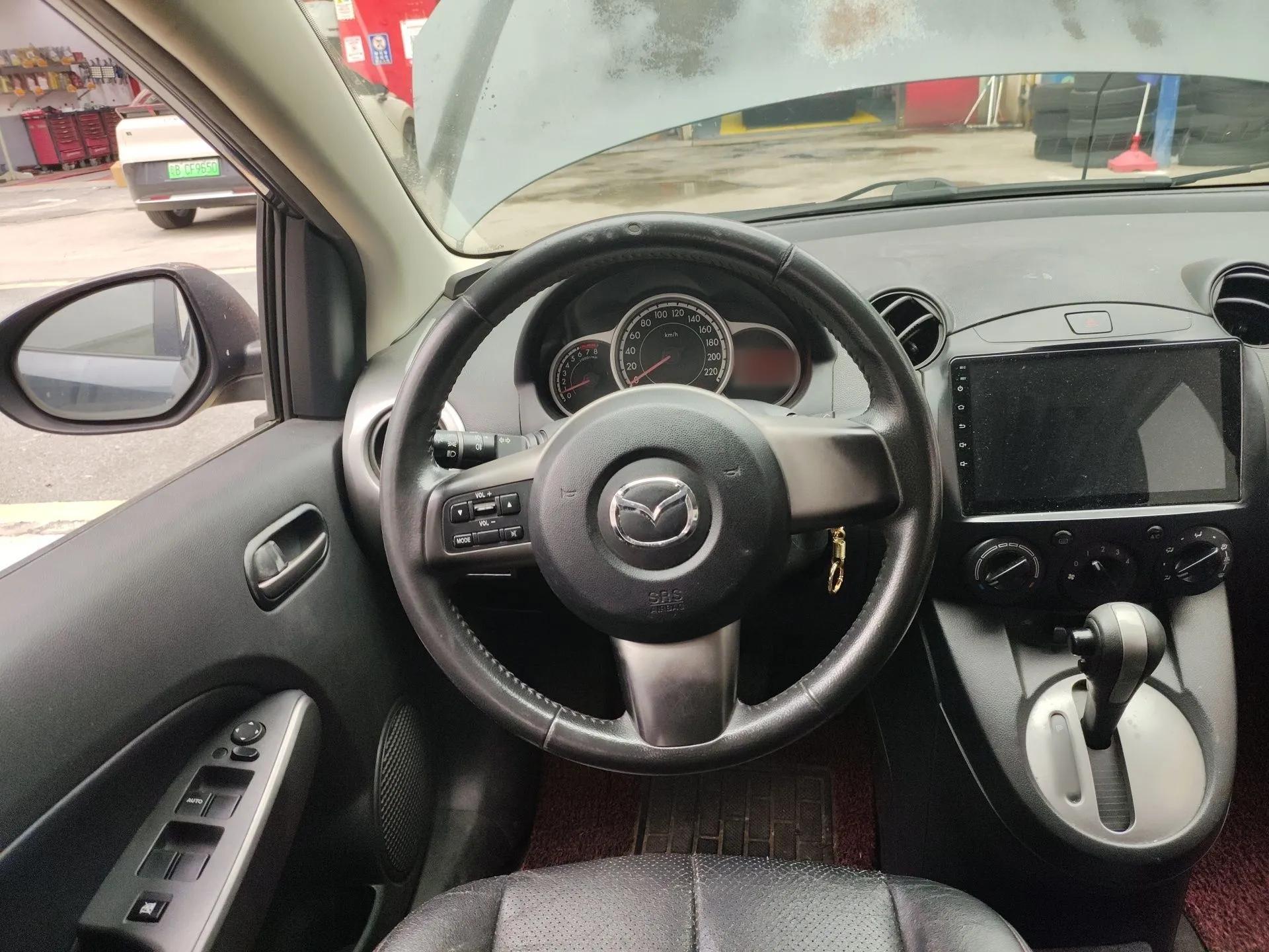 Mazda 2 2011 XuanDong 1.5L Automatic Value Edition — миниатюра 11