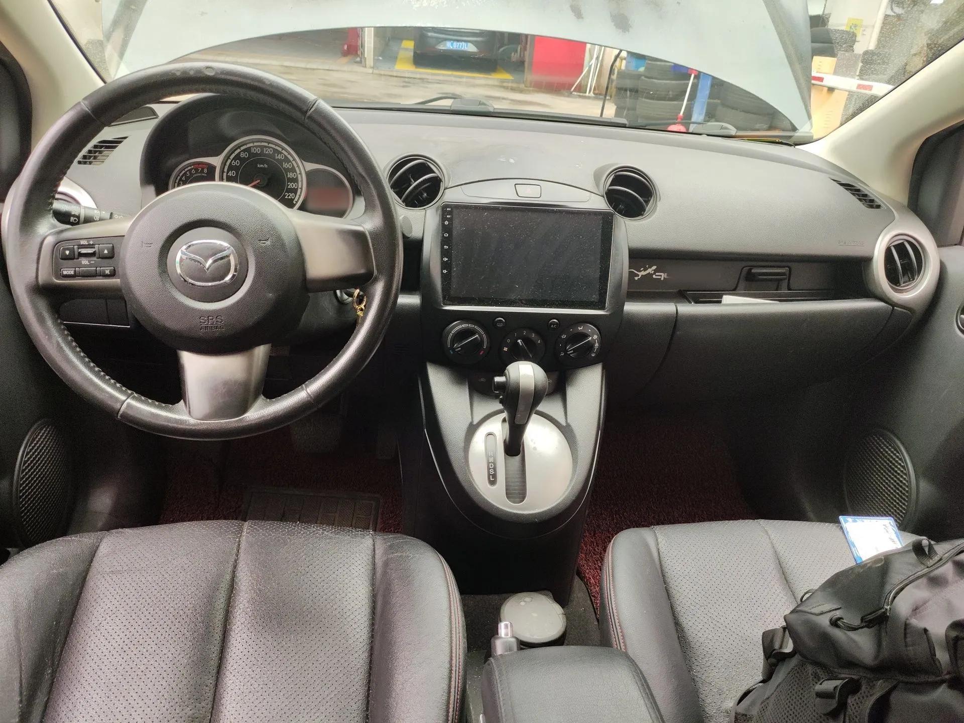 Mazda 2 2011 XuanDong 1.5L Automatic Value Edition — миниатюра 10