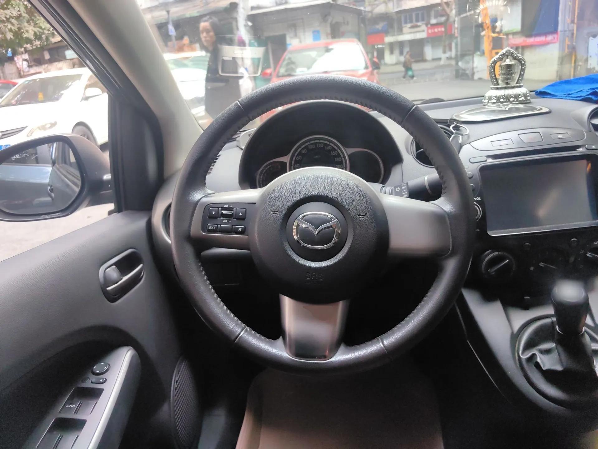 Mazda 2 2011 XuanDong 1.5L Manual Fashion Edition — миниатюра 11