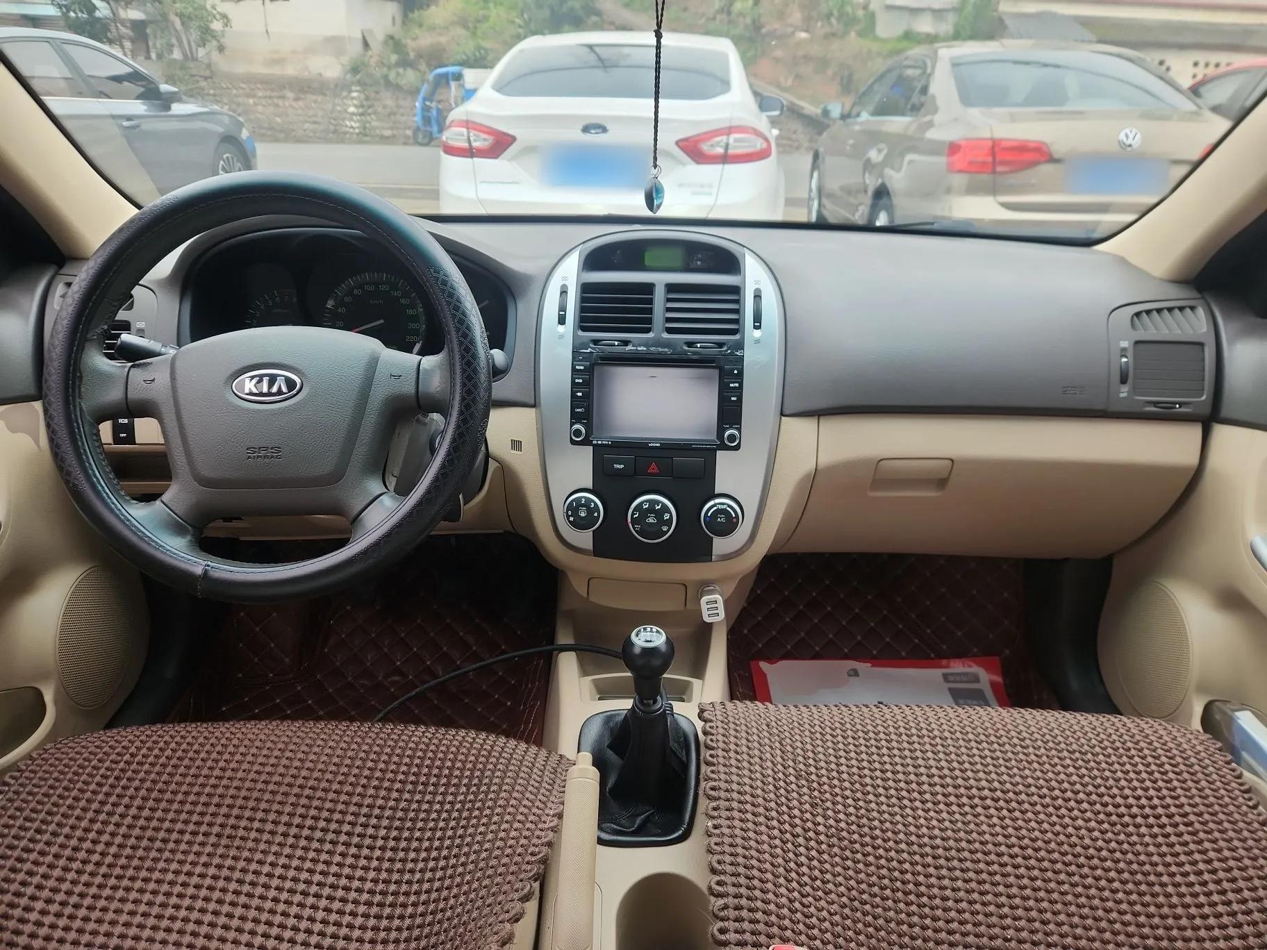 Kia Cerato 2012 1.6L MT GL — миниатюра 13