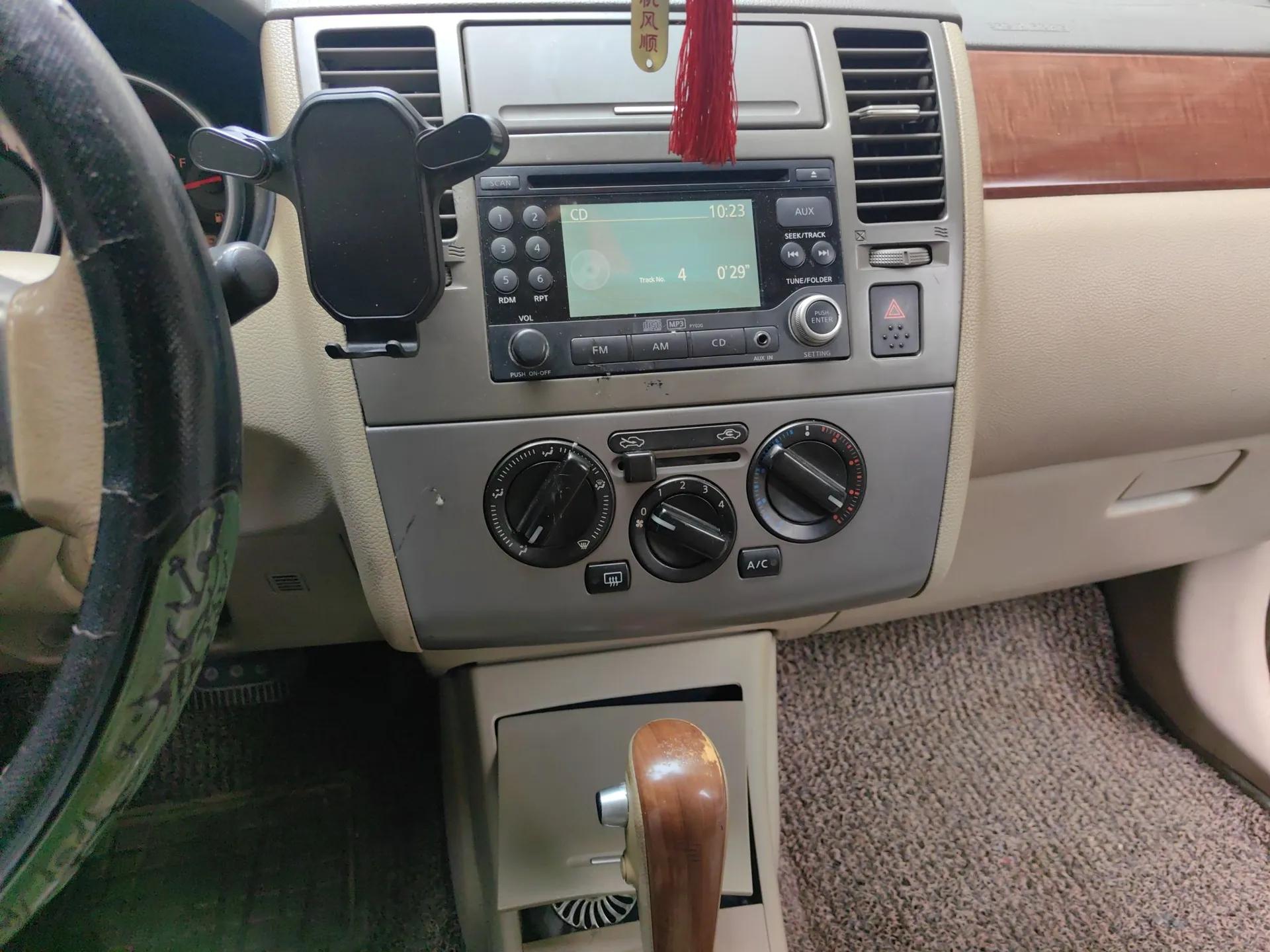 Nissan Tiida Sedan 2006 1.6JE AT — миниатюра 14