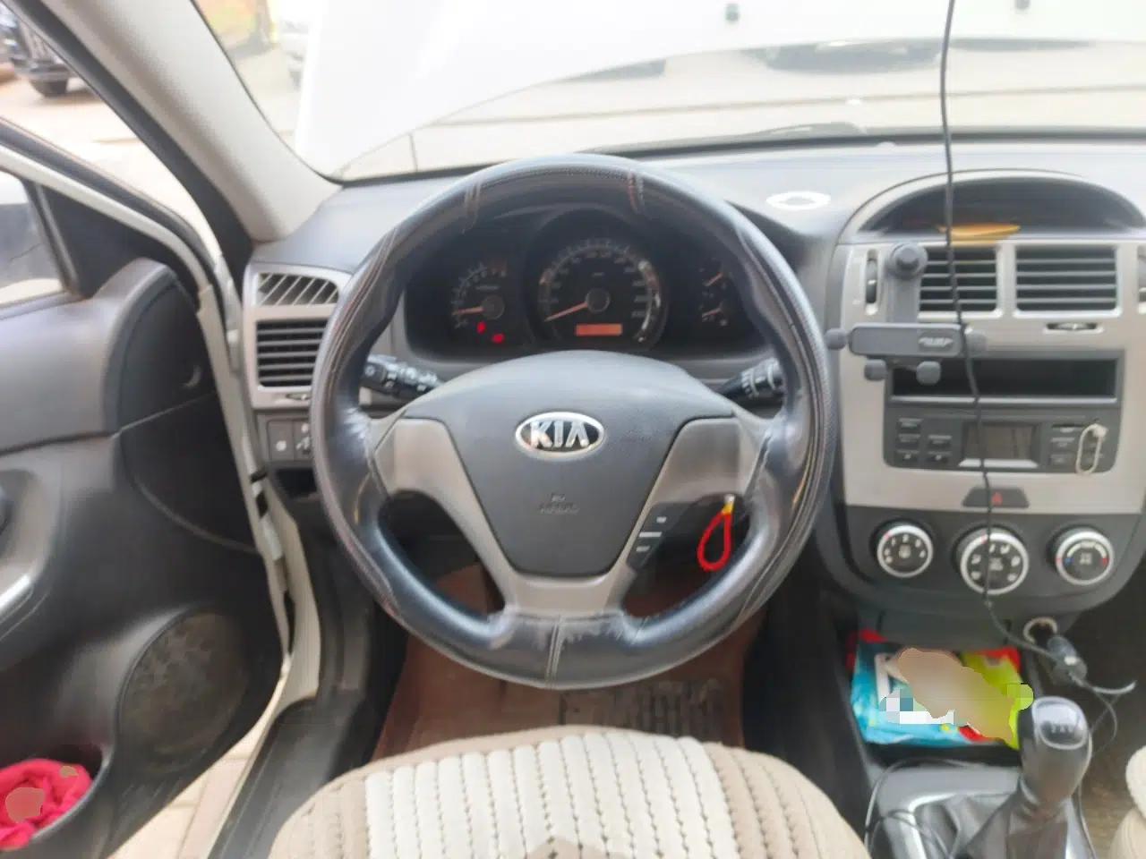 Kia Cerato 2012 1.6L MT GL — миниатюра 11