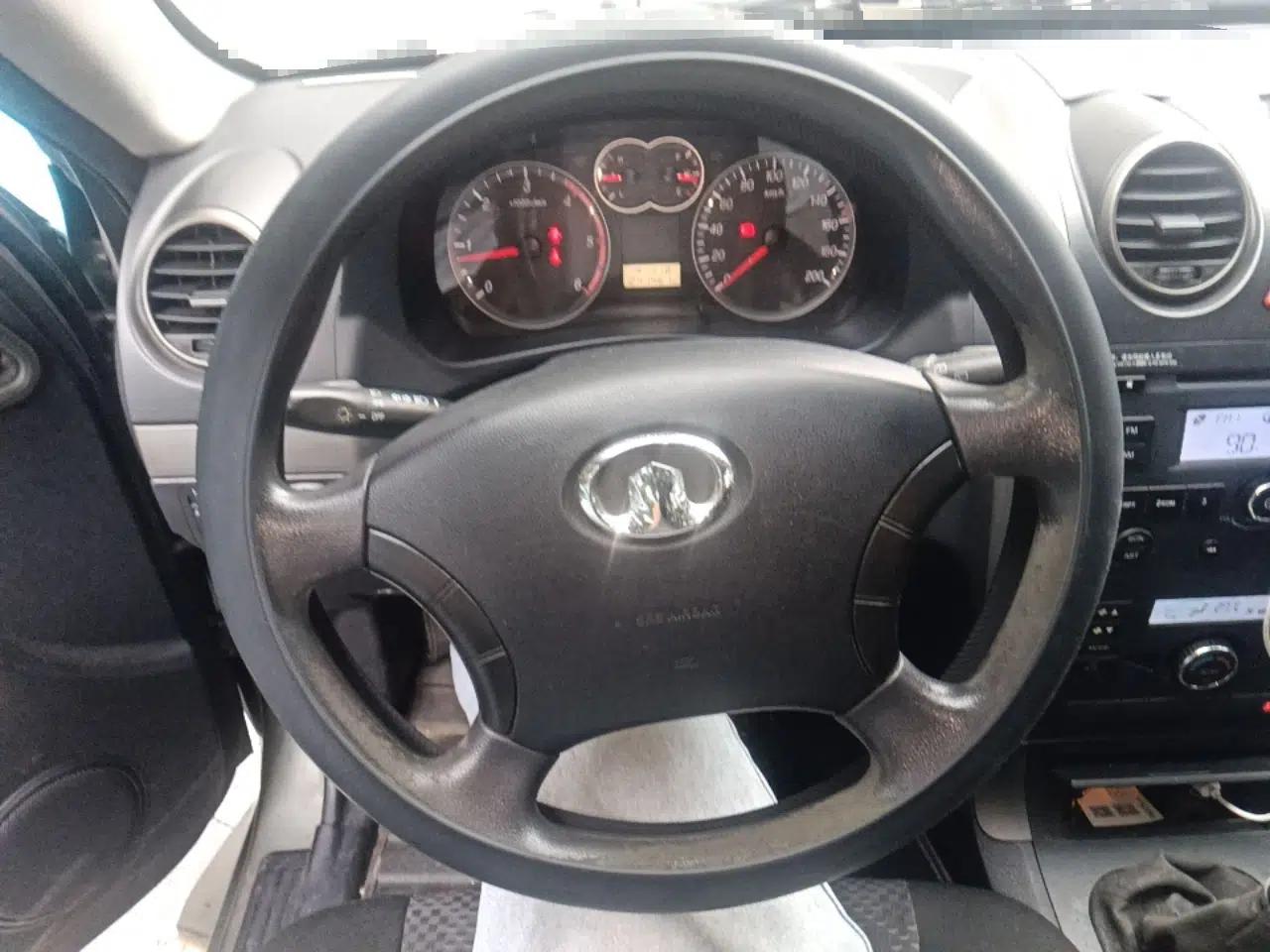 Haval H3 2012 2.5 TCI Two-Wheel-Drive Champion Edition — миниатюра 11