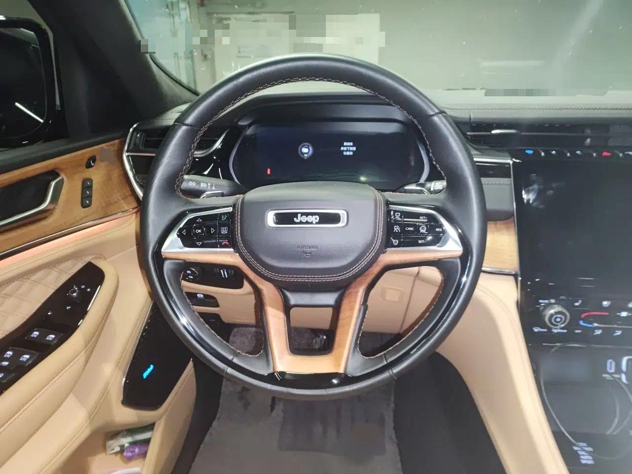 Jeep Grand Cherokee New Energy 2023 4xe Summit Edition — миниатюра 11