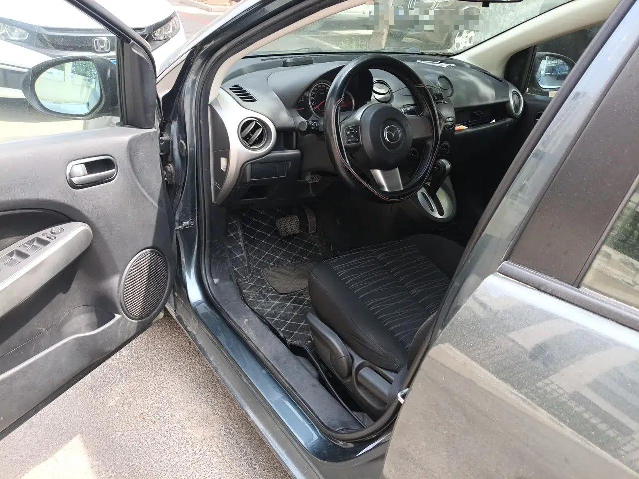 Mazda 2 2011 XuanDong 1.5L Automatic Value Edition — миниатюра 17