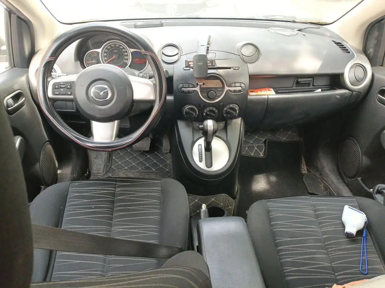 Mazda 2 2011 XuanDong 1.5L Automatic Value Edition — миниатюра 10