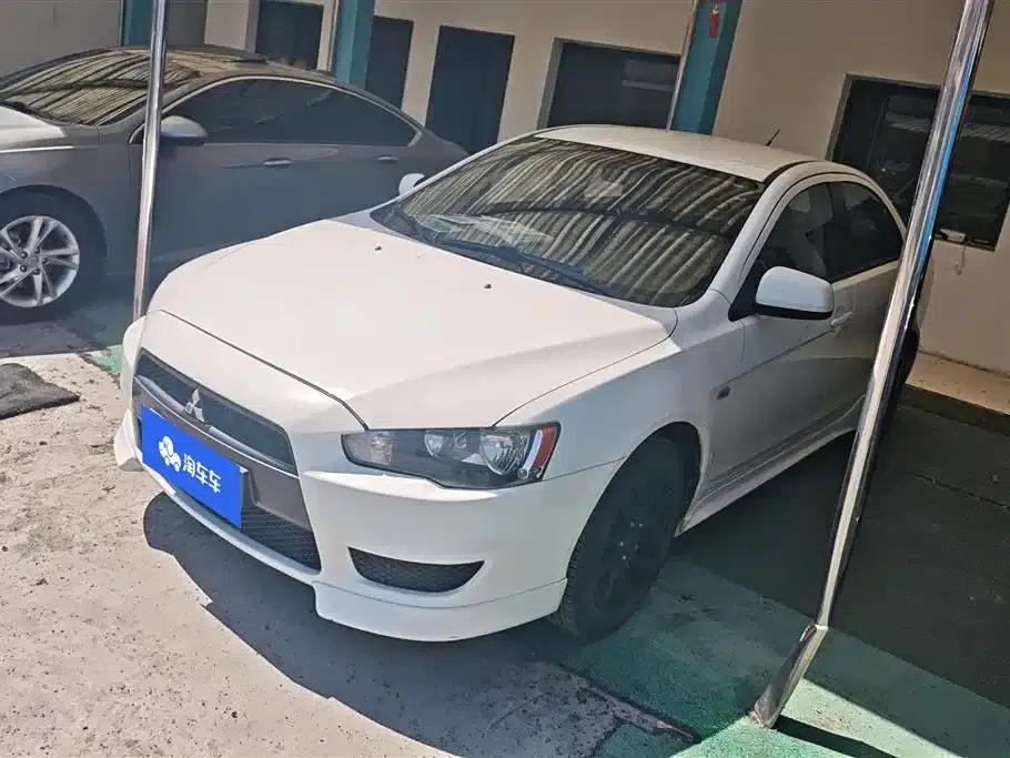 Lancer EX 2012 Yaris L 2.0L Manual Comfort Edition — миниатюра 1