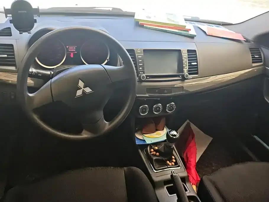 Lancer EX 2012 Yaris L 2.0L Manual Comfort Edition — миниатюра 12