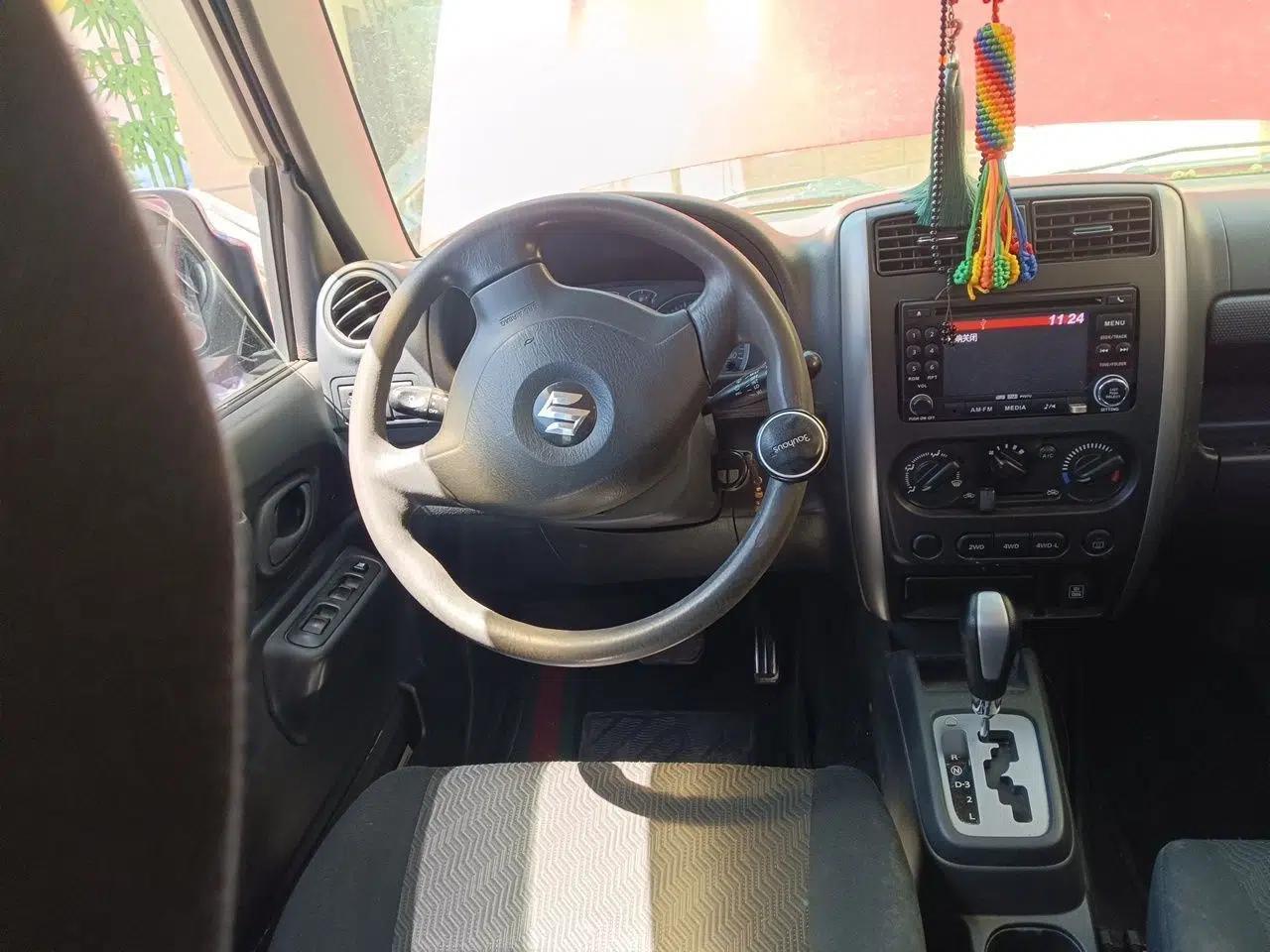 Suzuki Jimny 2012 1.3 AT JLX — миниатюра 11