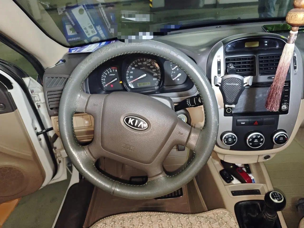 Kia Cerato 2012 1.6L MT GL — миниатюра 11
