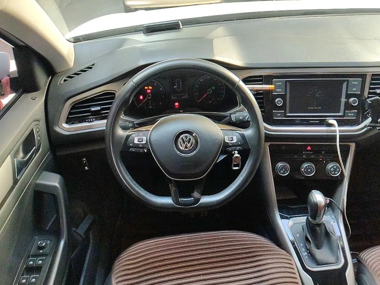 Volkswagen T-ROC 2019 230TSI DSG Two-Wheel-Drive Advanced Version China VI Standard — миниатюра 11