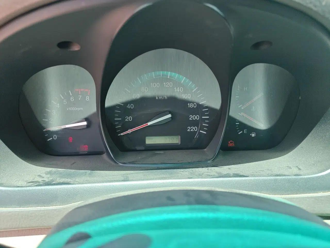 Kia Cerato 2012 1.6L MT GL — миниатюра 12