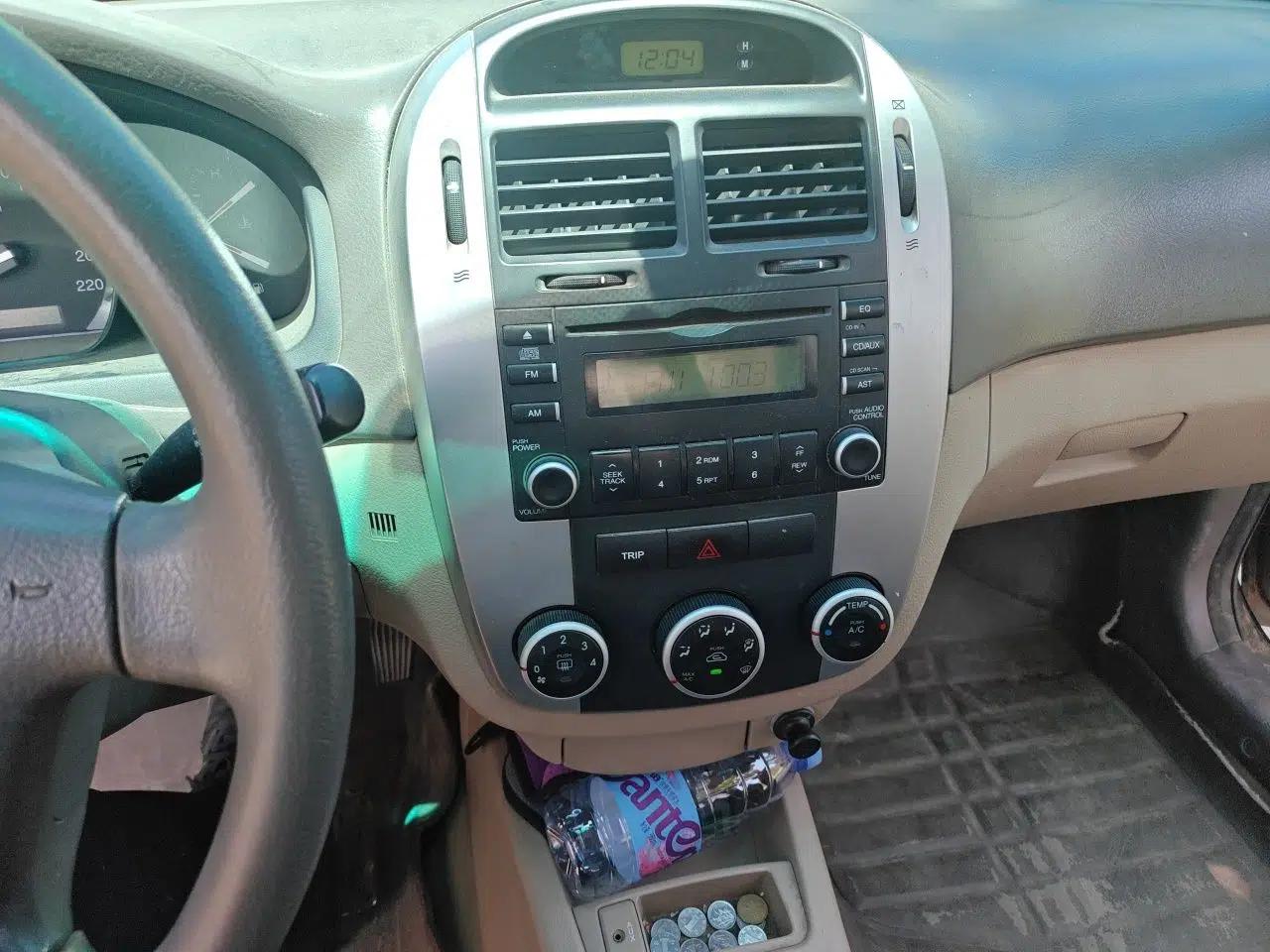 Kia Cerato 2012 1.6L MT GL — миниатюра 14