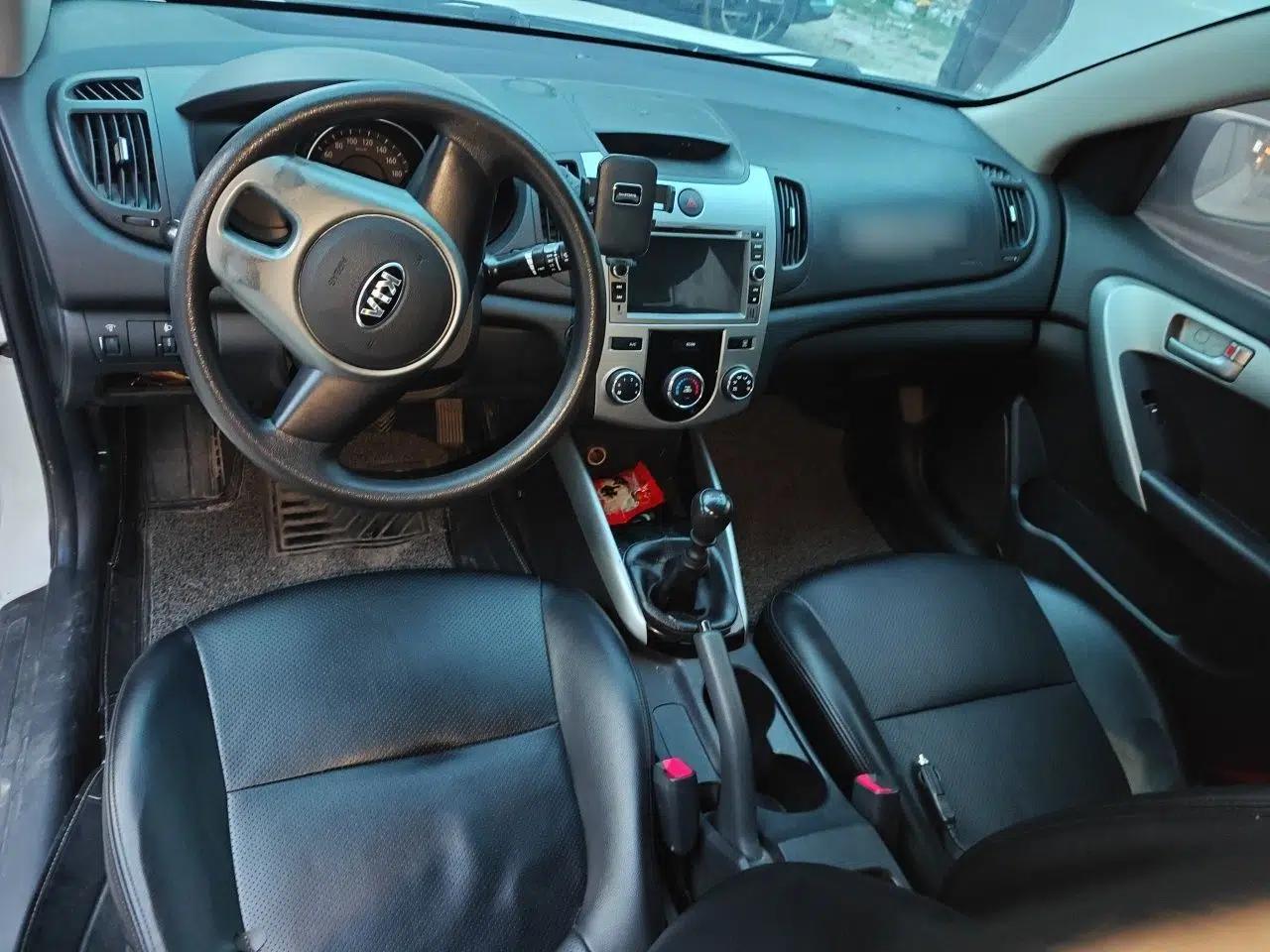 Kia Forte 2014 1.6L MT GL — миниатюра 10