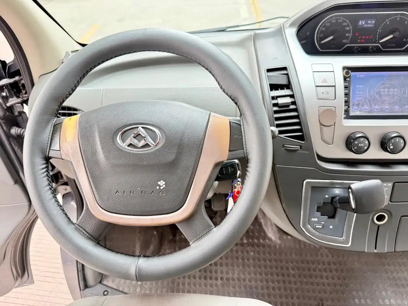 Xintu V80 2016 Model 2.5T AMT Aoyuntong National V Long Wheelbase Mid-Roof 7 Seats — миниатюра 17