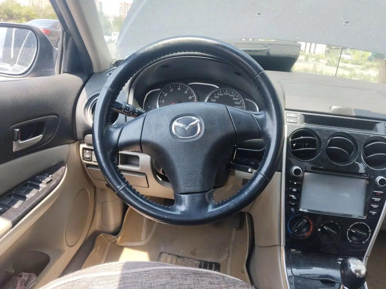 Mazda 6 2011 2.0L Manual Trim — миниатюра 11