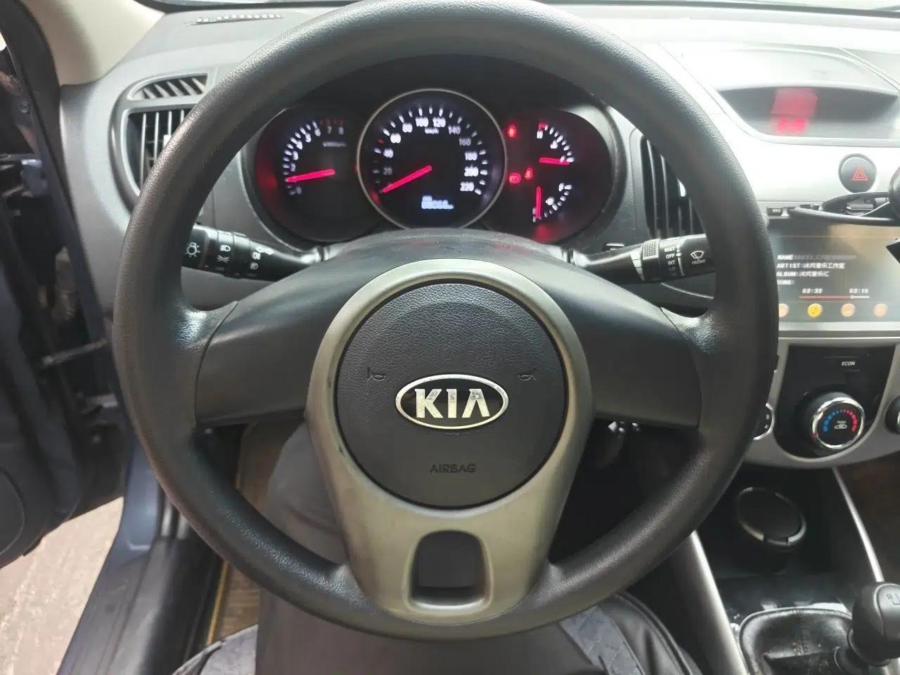 Kia Forte 2014 1.6L MT GL — миниатюра 11