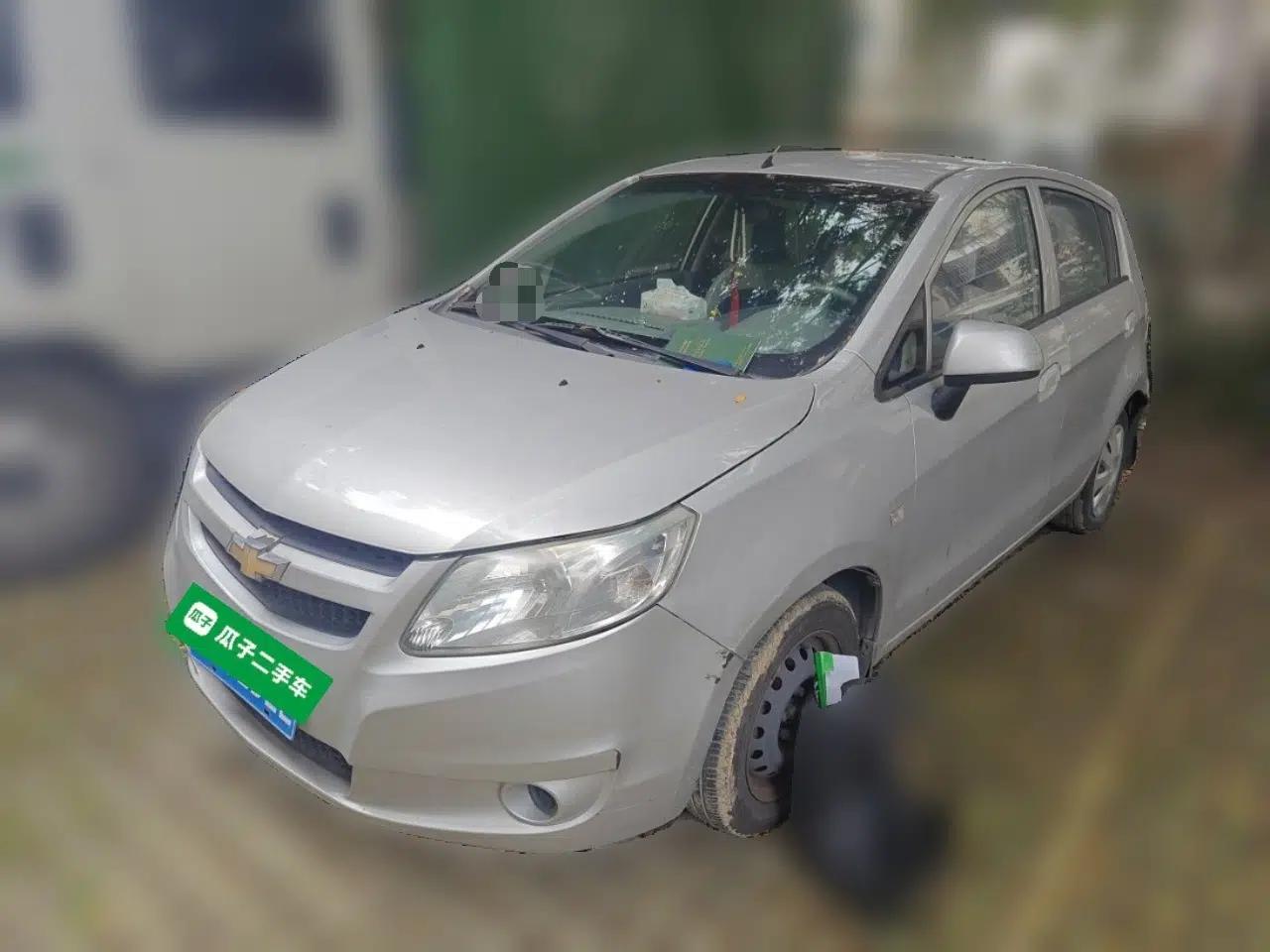 Chevrolet Sail 2010 Hatchback 1.2L Manual Warm Edition — миниатюра 1