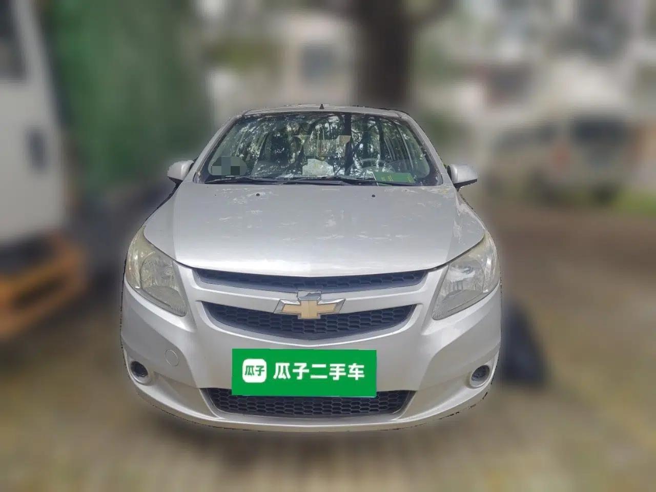 Chevrolet Sail 2010 Hatchback 1.2L Manual Warm Edition — миниатюра 2