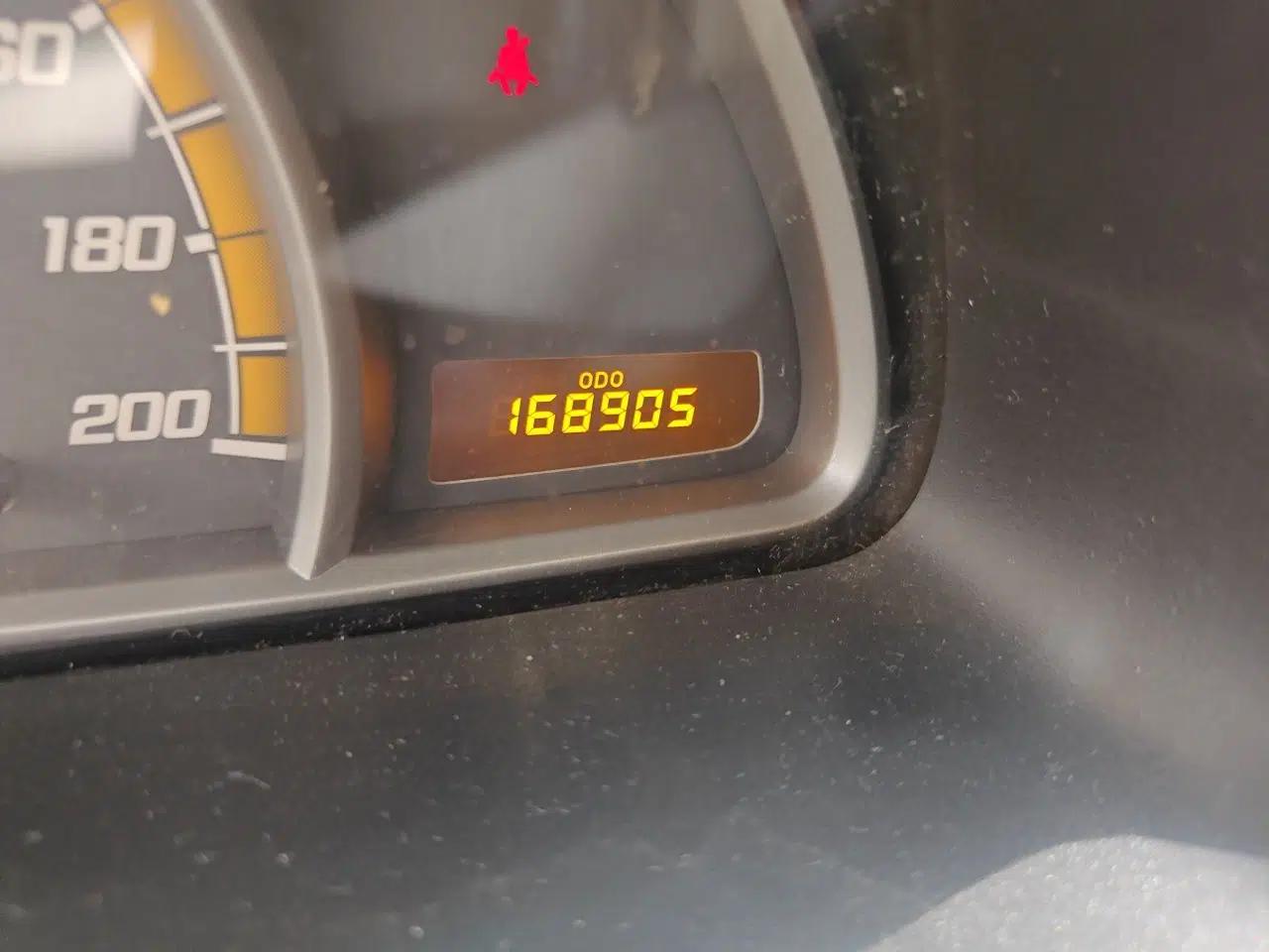Chevrolet Sail 2010 Hatchback 1.2L Manual Warm Edition — миниатюра 13