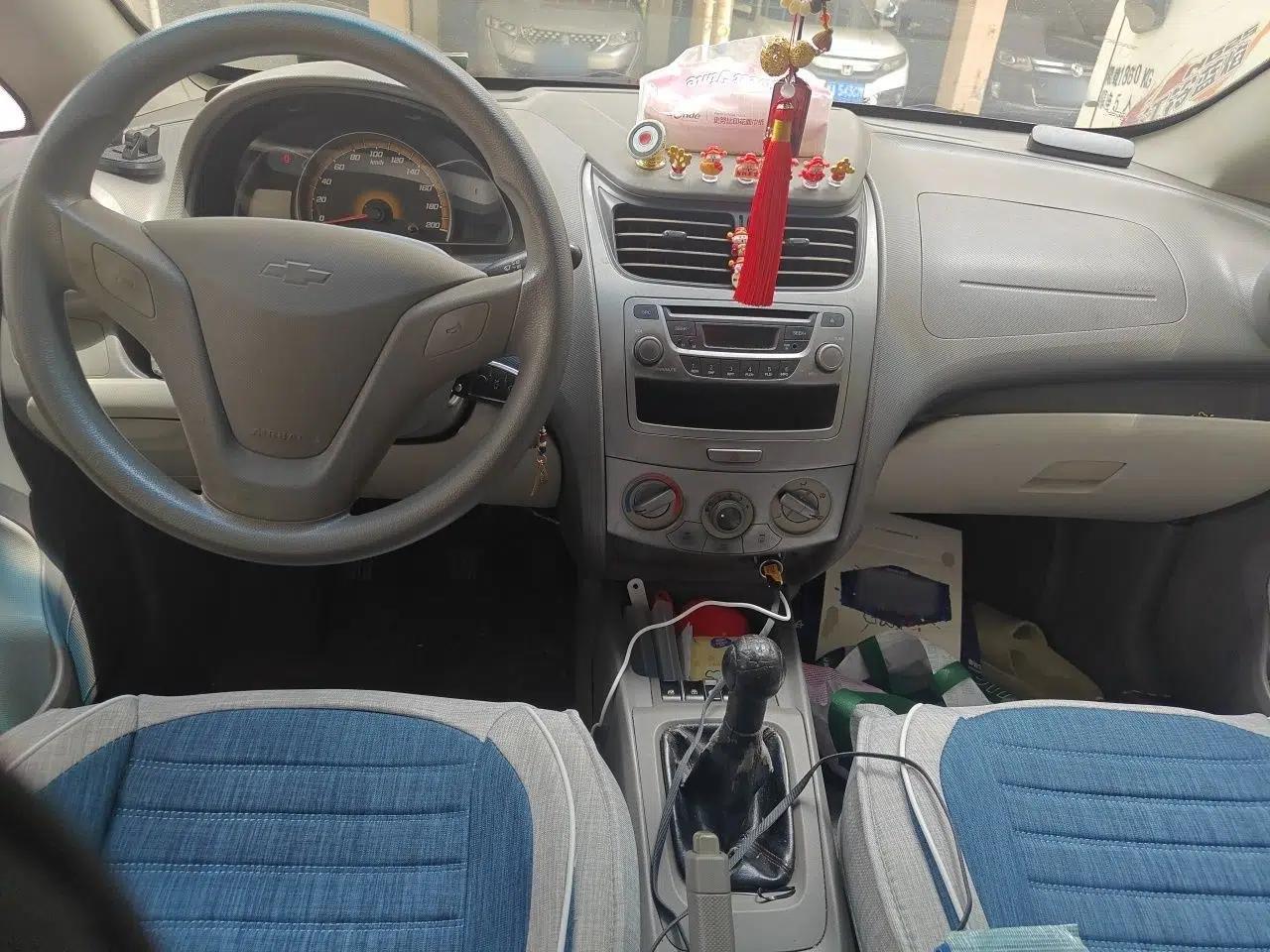 Chevrolet Sail 2010 Hatchback 1.2L Manual Warm Edition — миниатюра 10