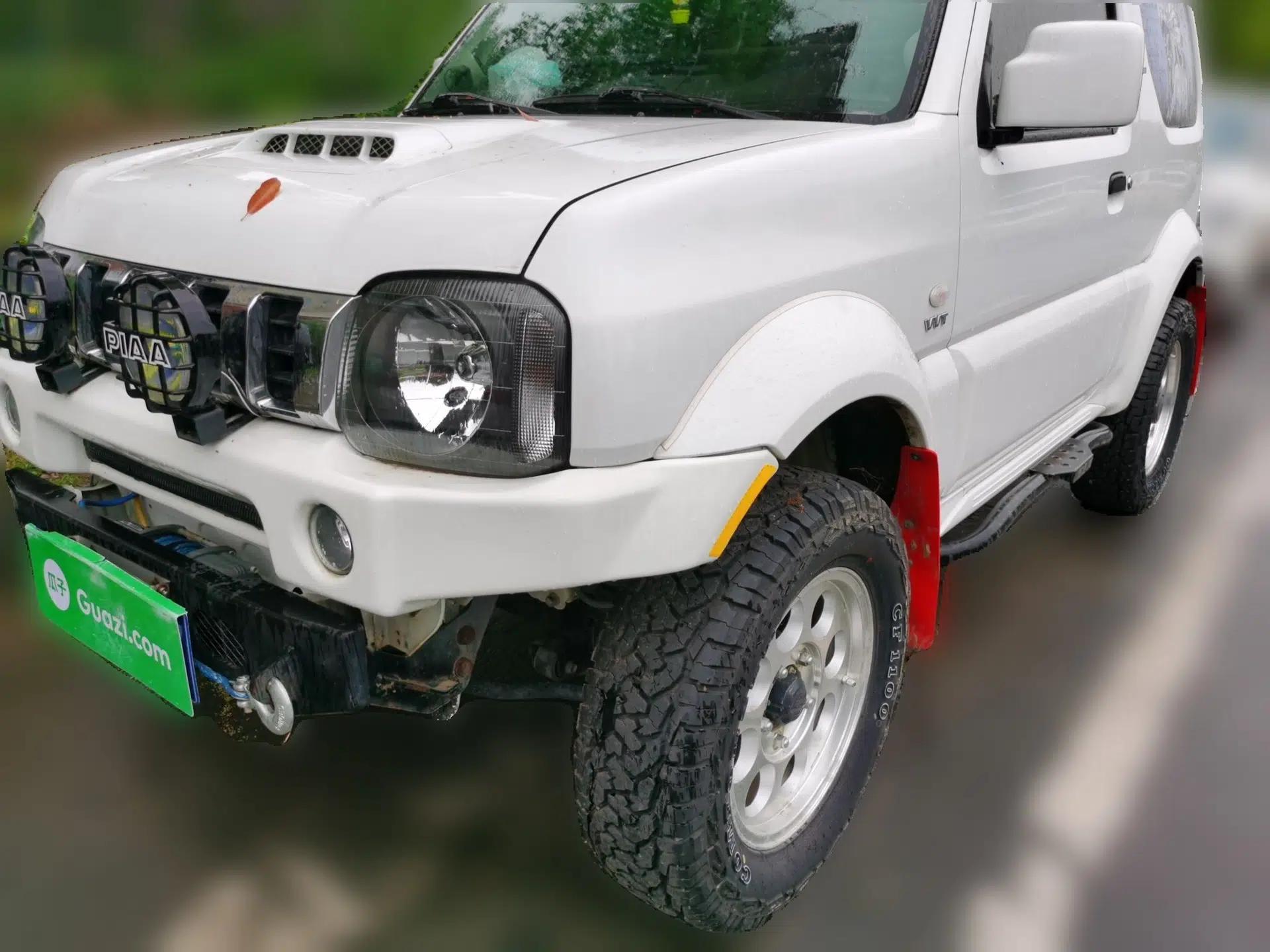 Suzuki Jimny 2012 1.3 AT JLX Navigation Edition — миниатюра 1