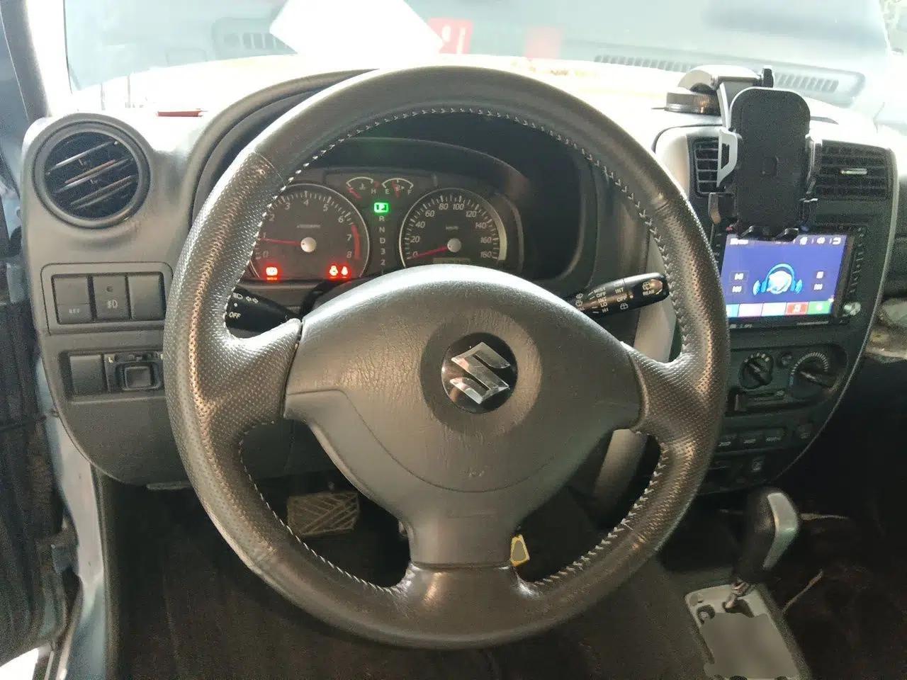 Suzuki Jimny 2012 1.3 AT Mode3 Navigation Edition — миниатюра 11