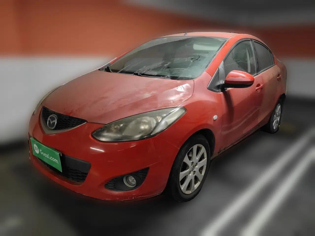 Mazda 2 2011 XuanDong 1.5L Manual Fashion Edition — миниатюра 1