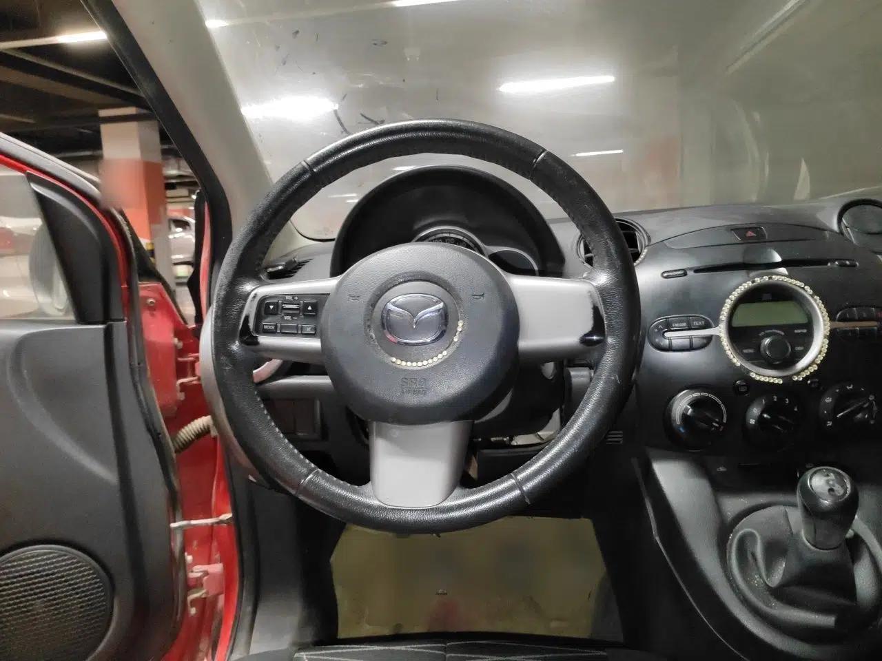 Mazda 2 2011 XuanDong 1.5L Manual Fashion Edition — миниатюра 11