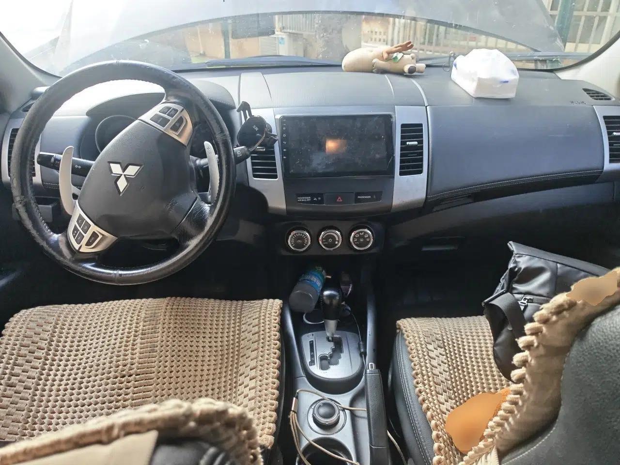 Mitsubishi Outlander 2012 Kicks 2.4 Fashion Navigation Edition — миниатюра 10