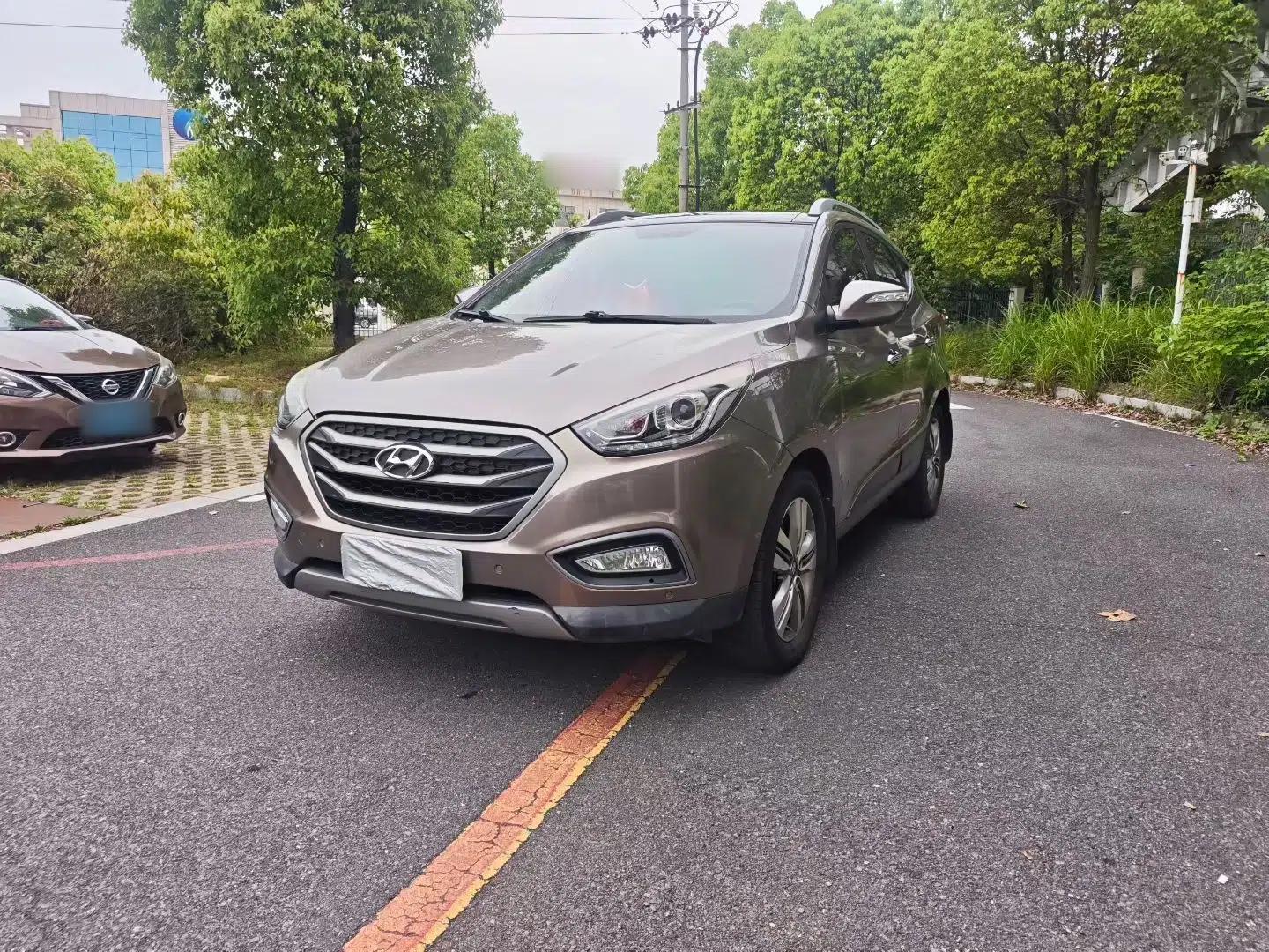 Hyundai ix35 2013 2.0L Automatic Two-Wheel Drive Leading GLX China V Emission Standard — миниатюра 1