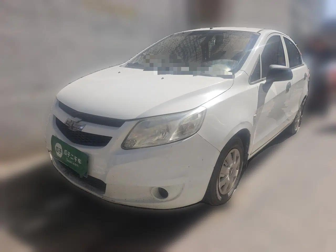 Chevrolet Sail 2013 Sedan 1.2L Manual Warm Edition — миниатюра 1