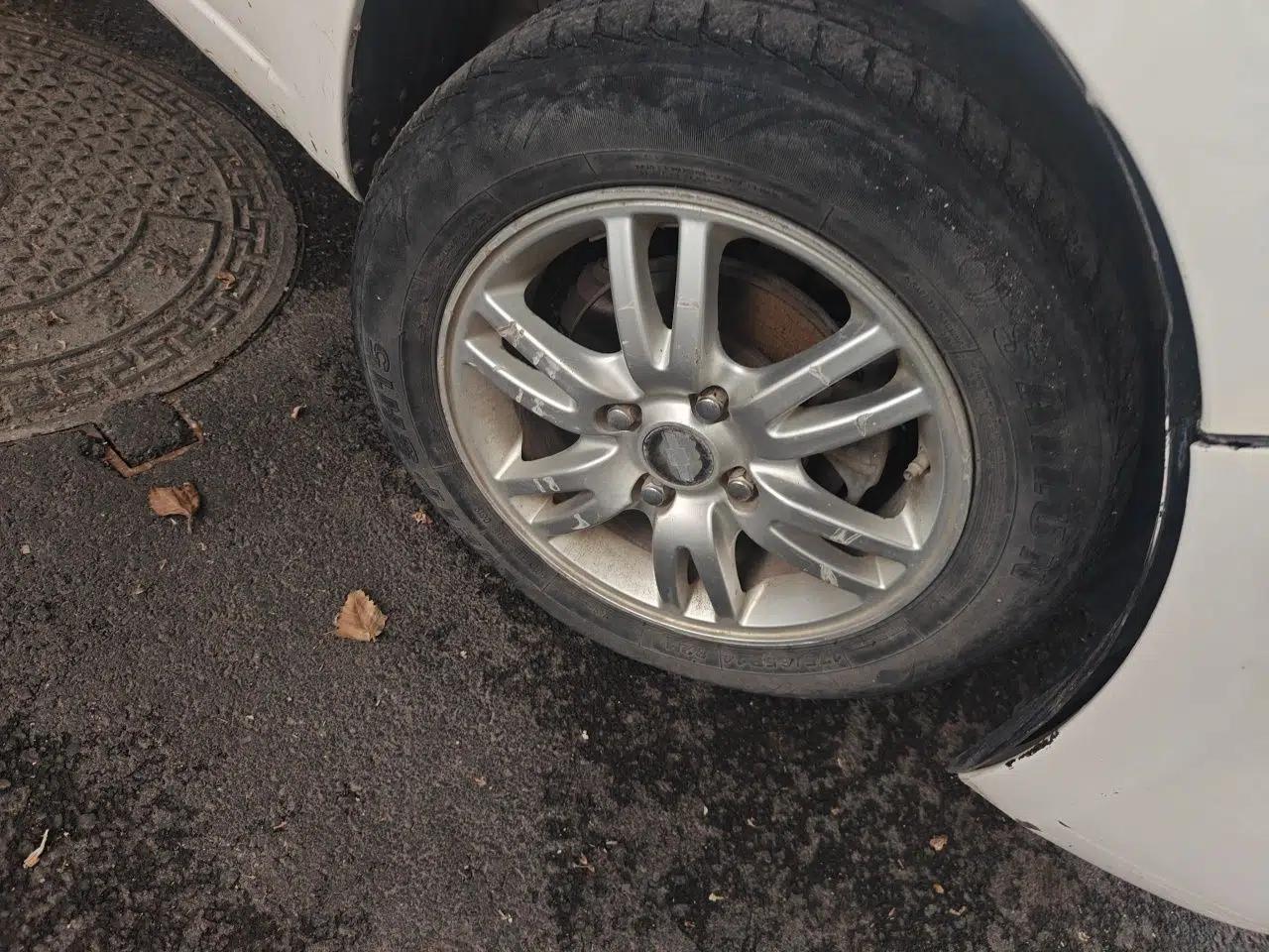 Chevrolet Sail 2011 Hatchback 1.4L AMT Happiness Edition — миниатюра 8