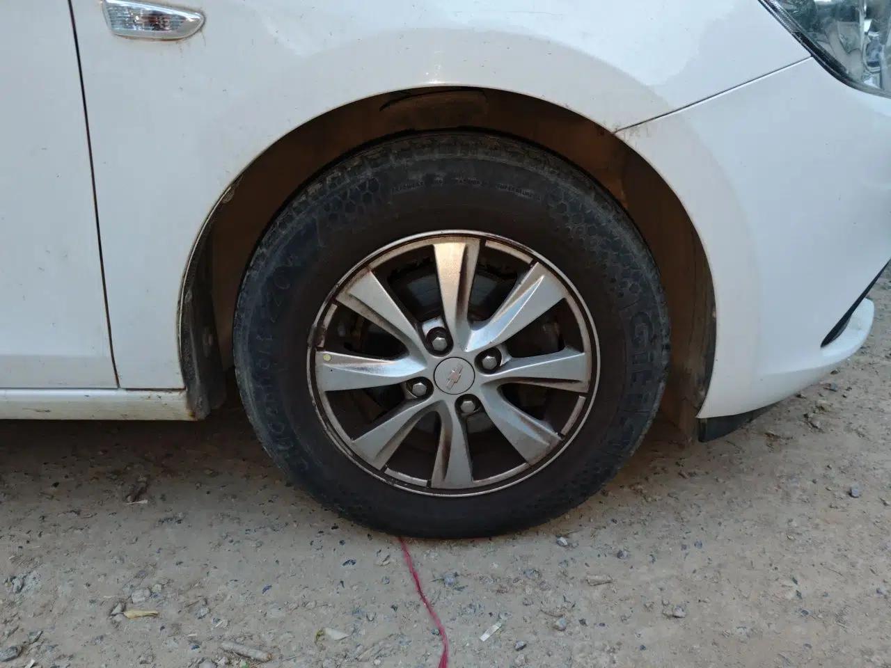 Chevrolet Sail 2011 Sedan 1.4L AMT Happiness Edition — миниатюра 8