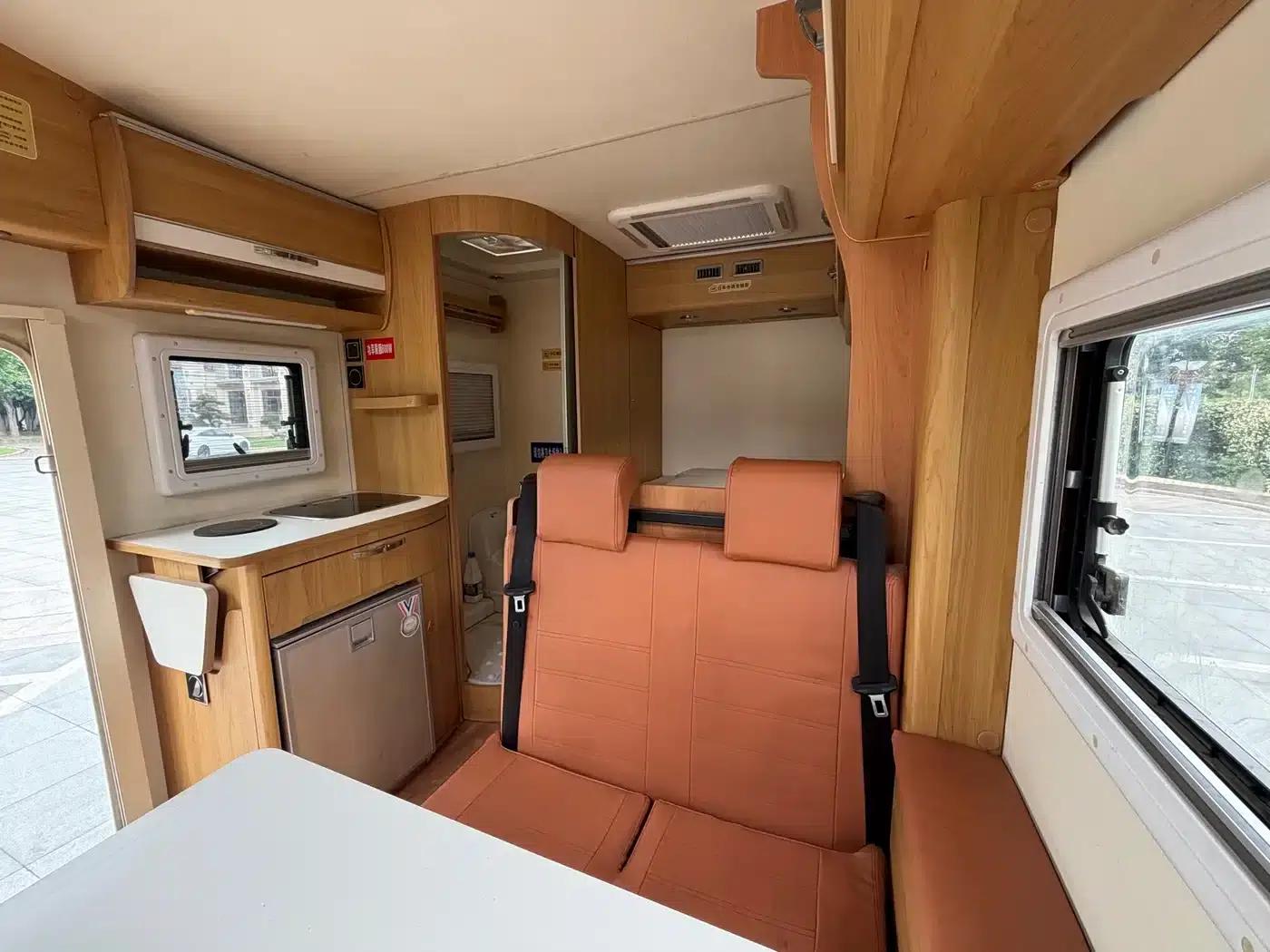 Xintu V80 2017 Model 2.5T AMT Aoyuntong National V Long Wheelbase Mid-Roof 5-Seater — миниатюра 13