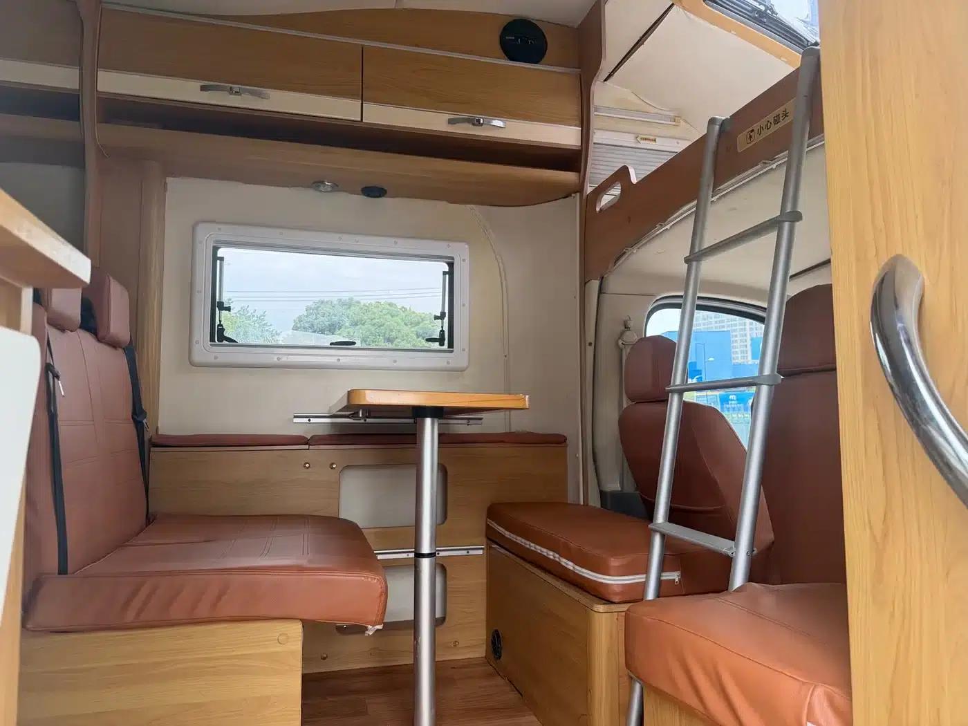 Xintu V80 2017 Model 2.5T AMT Aoyuntong National V Long Wheelbase Mid-Roof 5-Seater — миниатюра 15