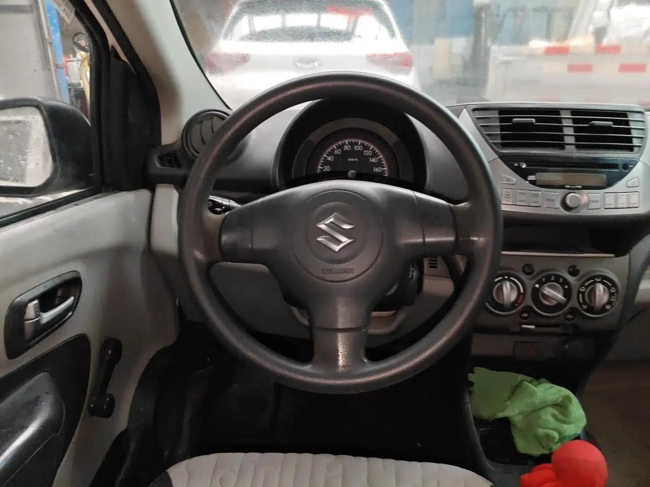Suzuki Alto 2013 1.0L Manual Utility Model — миниатюра 11