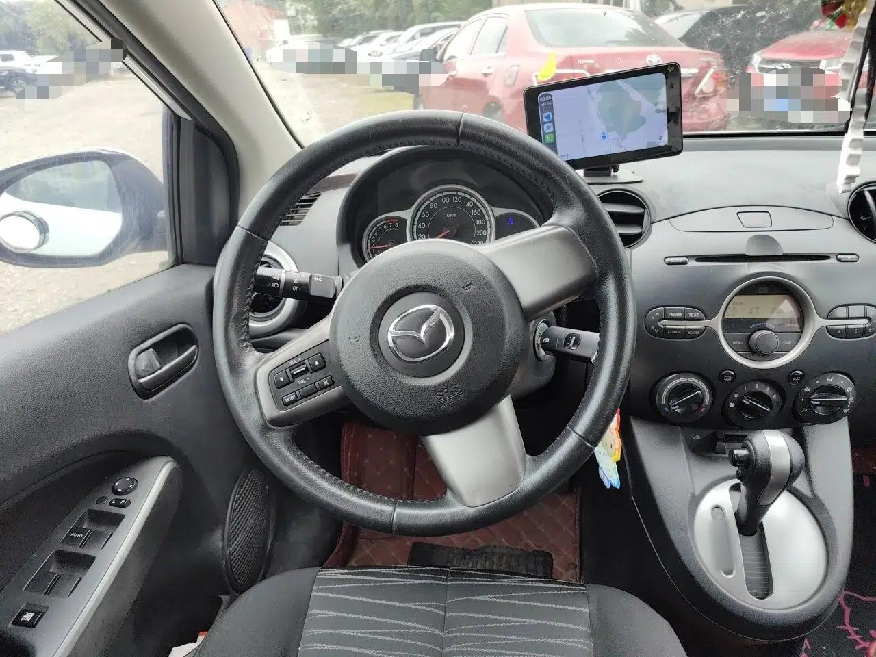 Mazda 2 2011 XuanDong 1.5L Automatic Value Edition — миниатюра 11