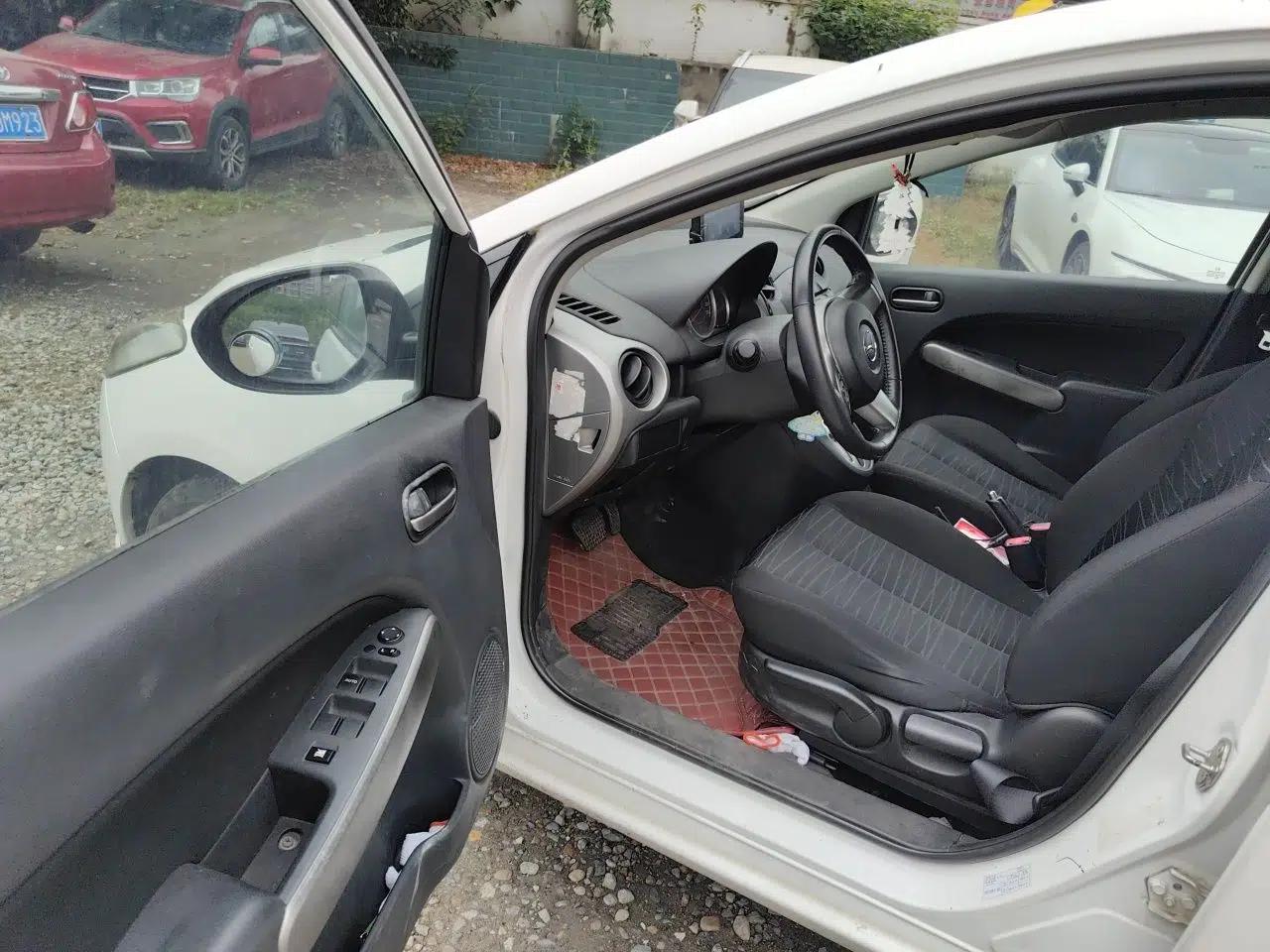 Mazda 2 2011 XuanDong 1.5L Automatic Value Edition — миниатюра 17