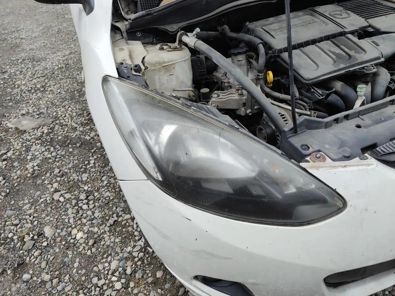 Mazda 2 2011 XuanDong 1.5L Automatic Value Edition — миниатюра 7