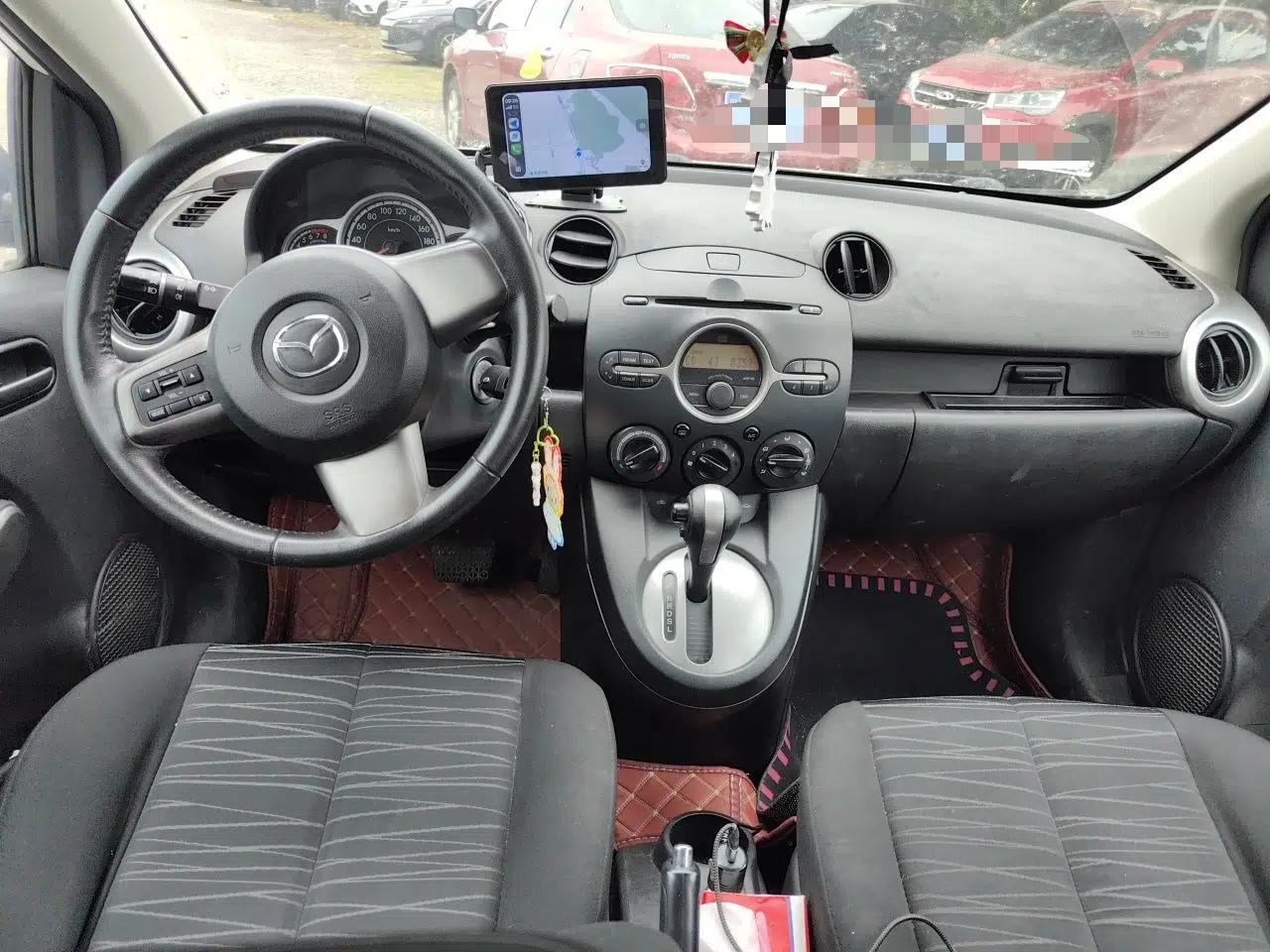Mazda 2 2011 XuanDong 1.5L Automatic Value Edition — миниатюра 10